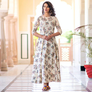 Refreshing Cream Colored Partywear Printed Muslin Blend Long Kurti - Peachmode