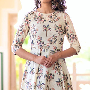 Refreshing Cream Colored Partywear Printed Muslin Blend Long Kurti - Peachmode