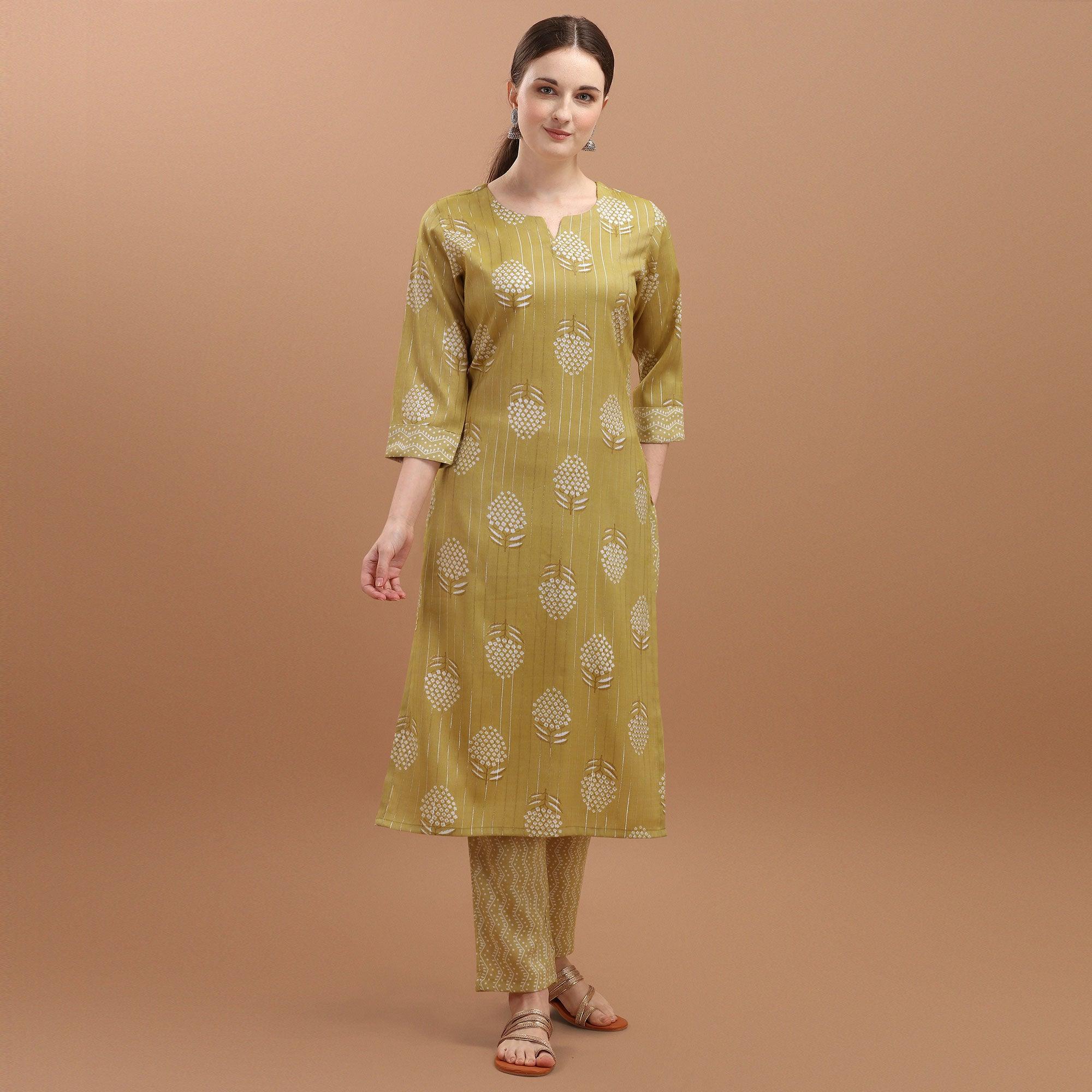 Refreshing Yellow Colored Casual Wear Silver Zari Foil Printed Rayon Slub Kurti - Pant Set - Peachmode