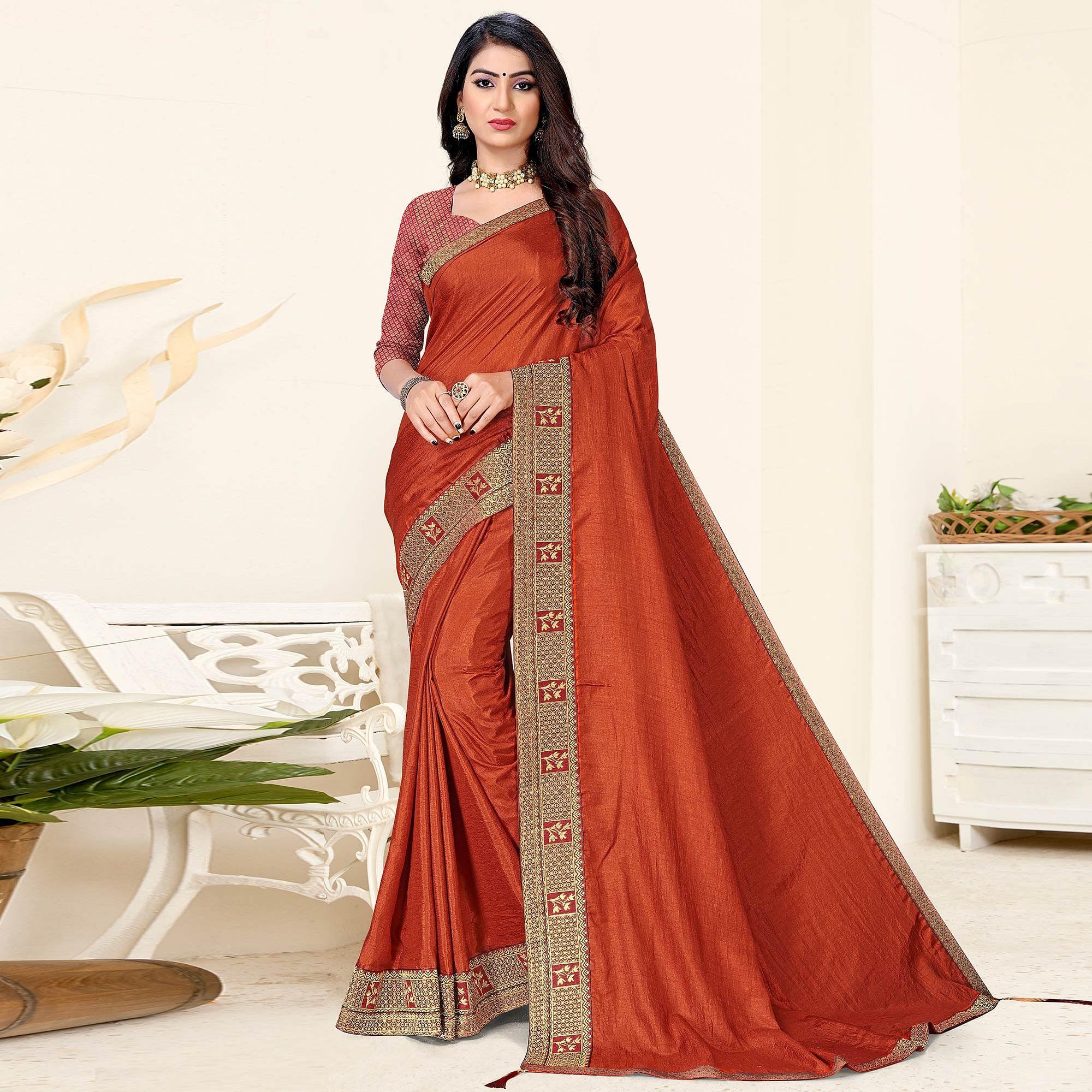 Rust Festive Wear Solid Art Silk Saree - Peachmode