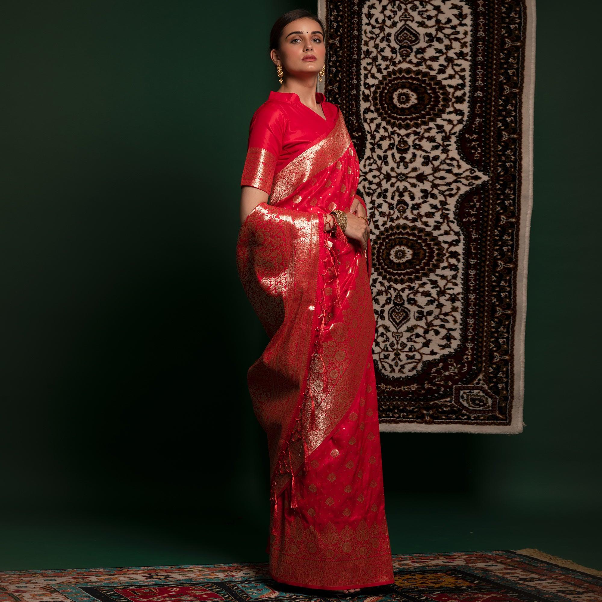 Salmon Pink Woven Art Silk Saree With Tassels - Peachmode