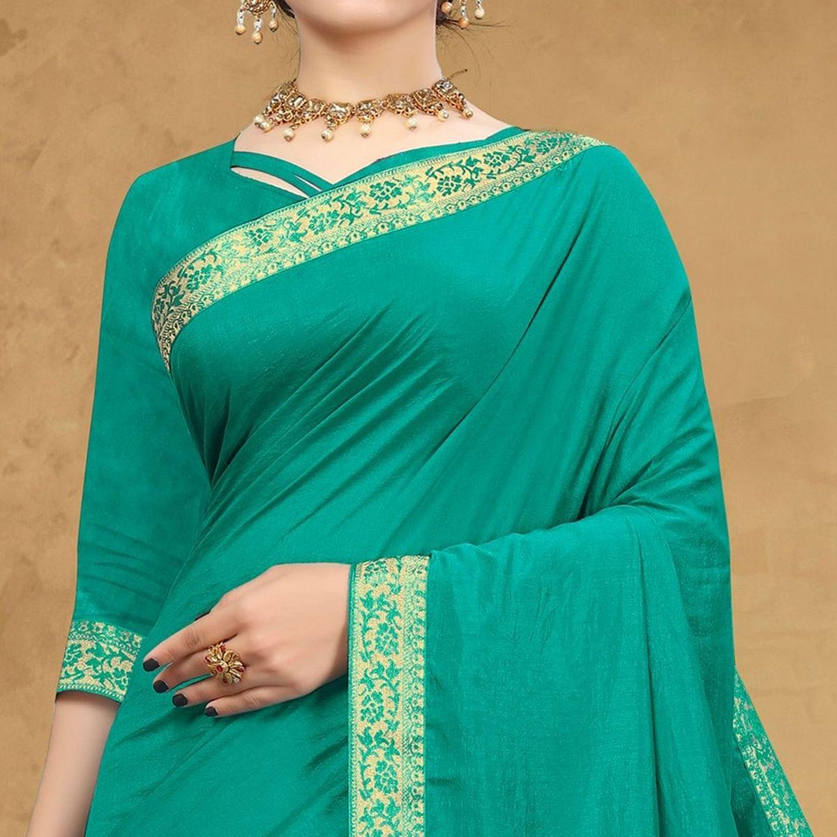 Sea Green Festive Wear Embellished Vichitra Silk Saree - Peachmode