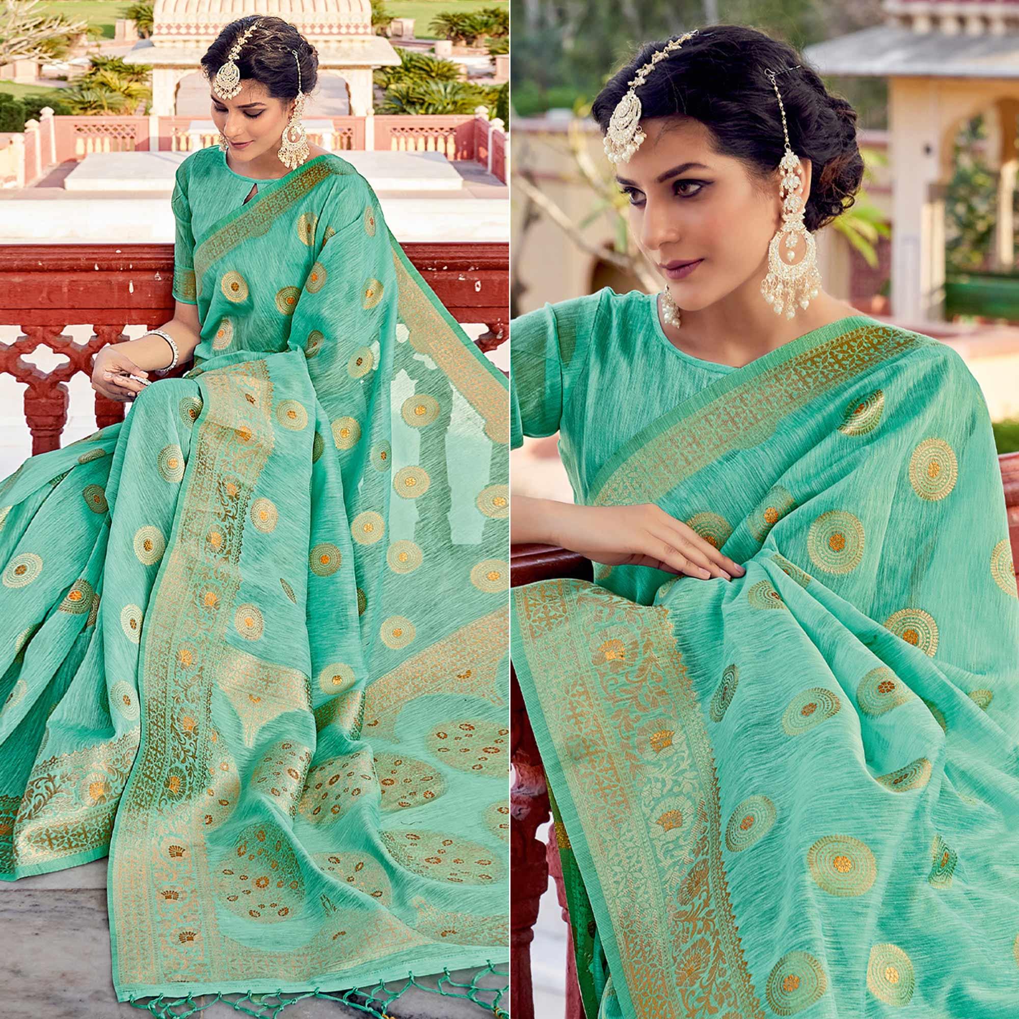 Sea Green Festive Wear Weaving Work Linen Saree With Tassels - Peachmode