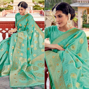 Sea Green Festive Wear Weaving Work Linen Saree With Tassels - Peachmode
