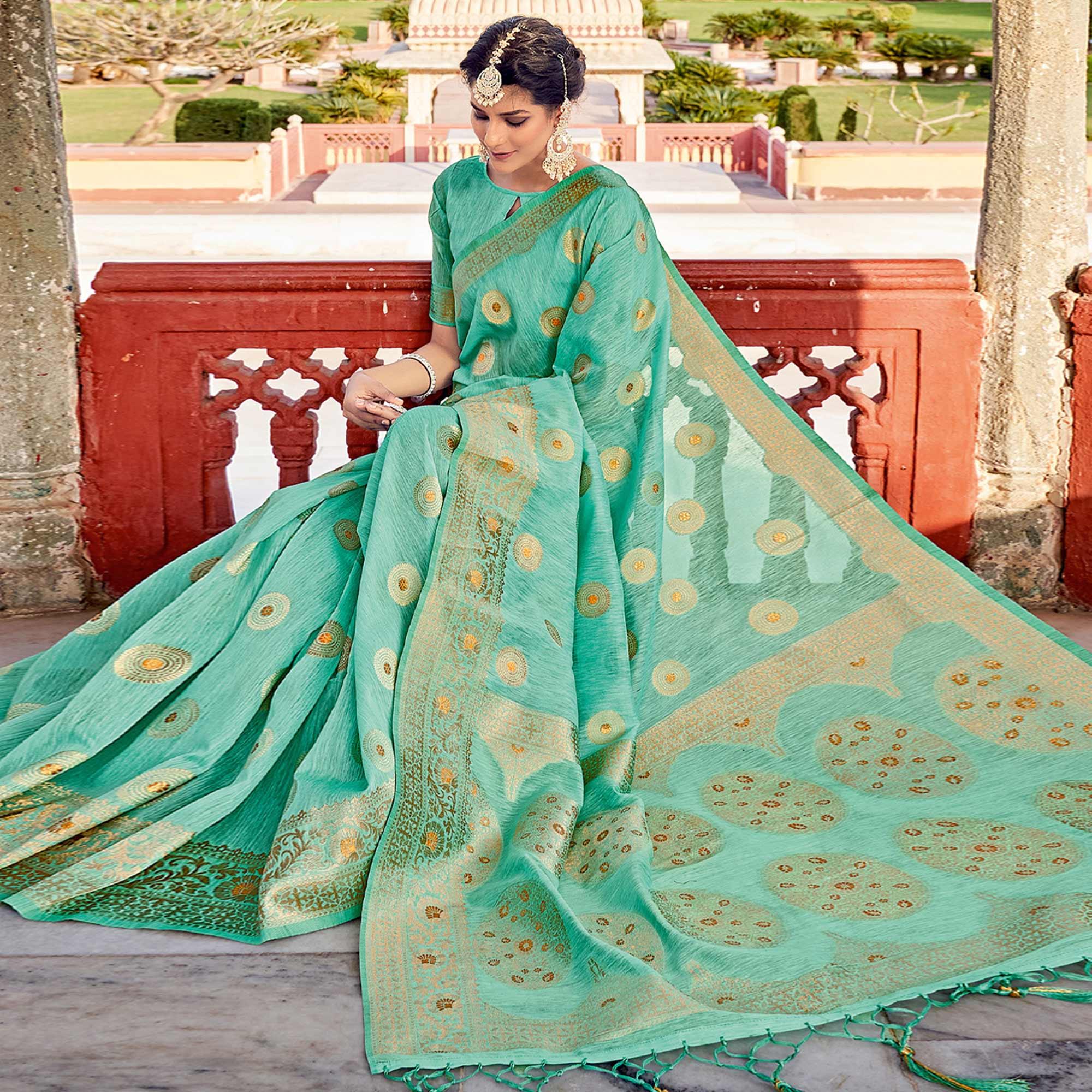 Sea Green Festive Wear Weaving Work Linen Saree With Tassels - Peachmode