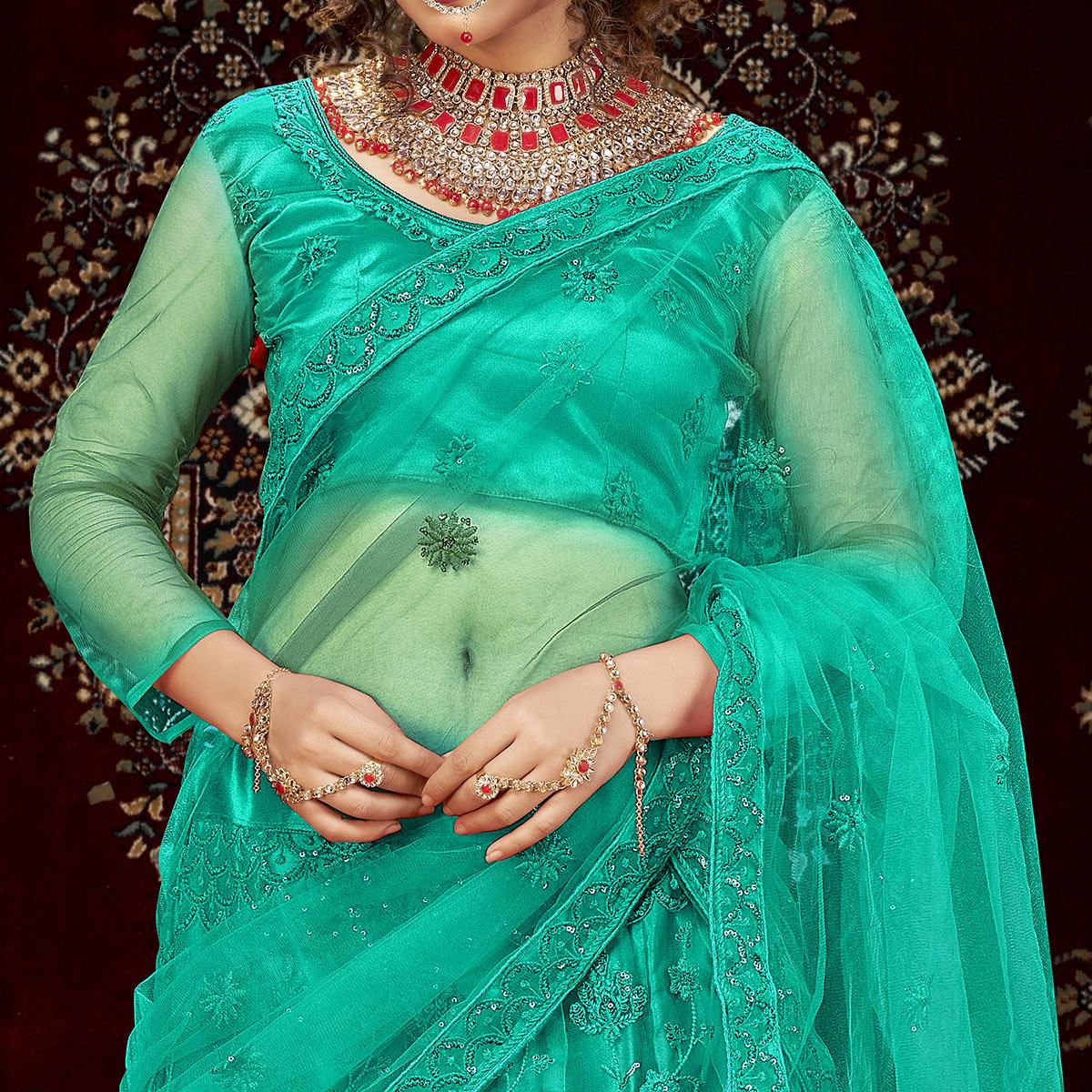 Sea Green Partywear Multi Sequence Embroidered Net Lehenga Choli - Peachmode