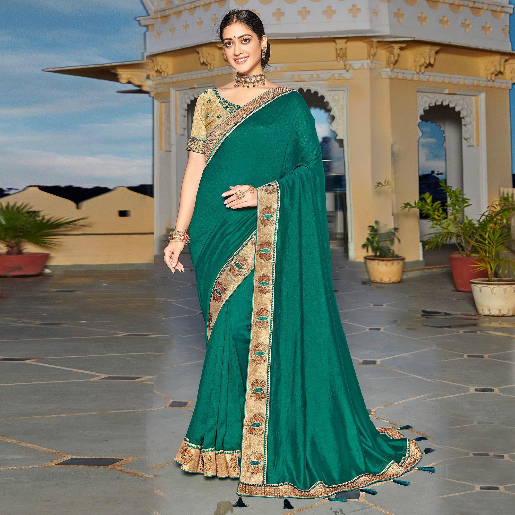 Sea Green Solid-Embroidered Border Vichitra Silk Saree With Tassels - Peachmode