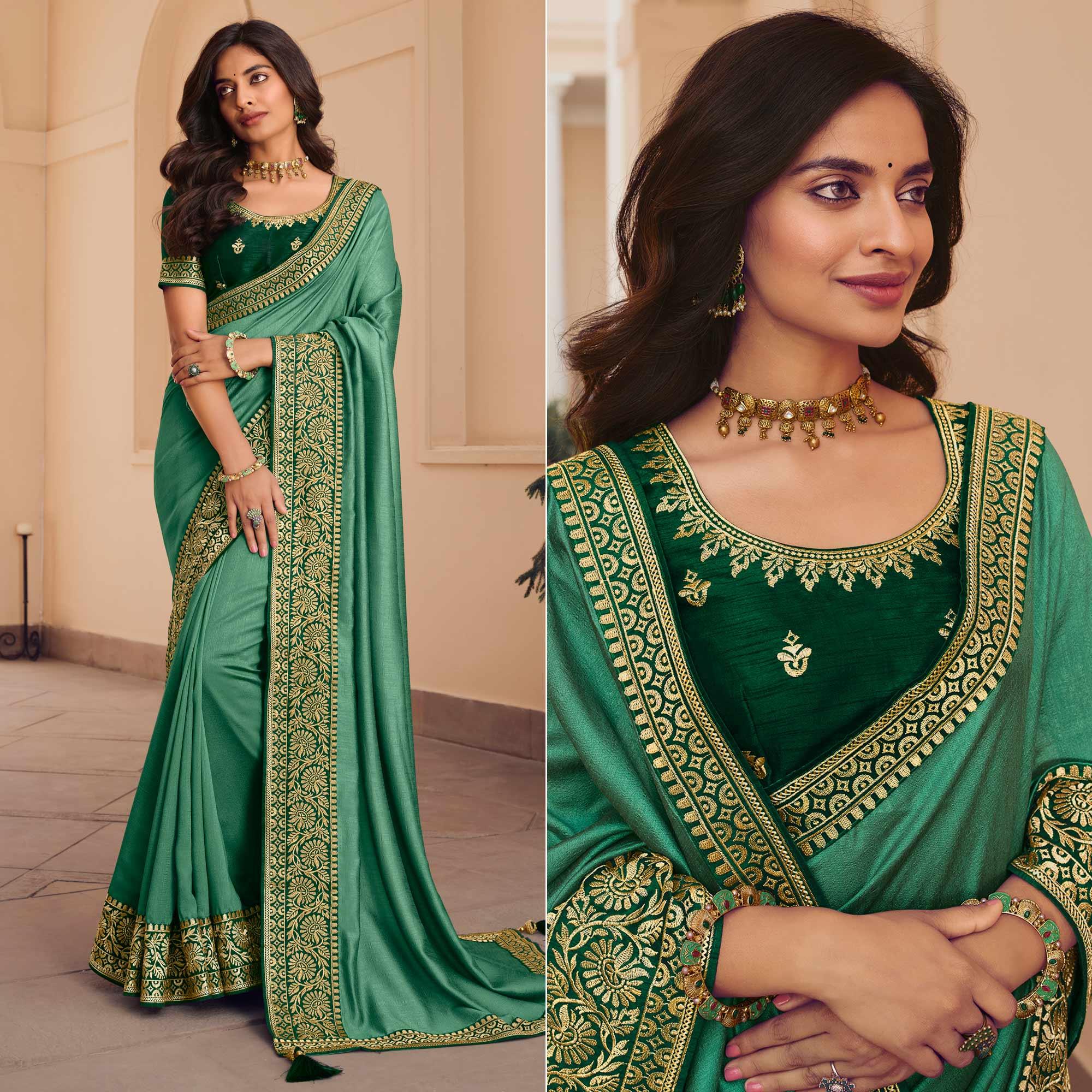 Sea Green Solid Vichitra Silk Saree With Tassels - Peachmode