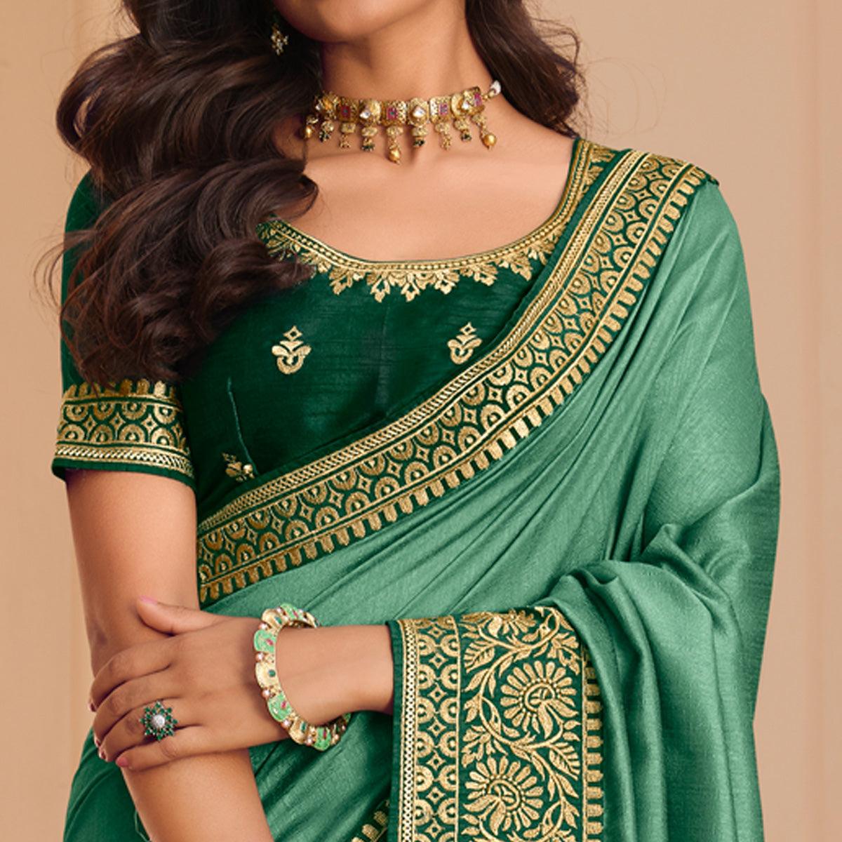 Sea Green Solid Vichitra Silk Saree With Tassels - Peachmode