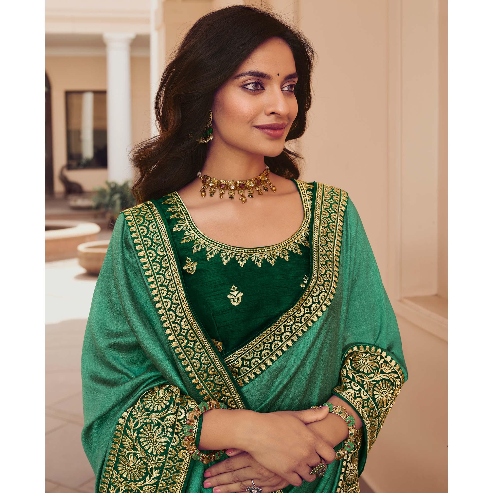 Sea Green Solid Vichitra Silk Saree With Tassels - Peachmode