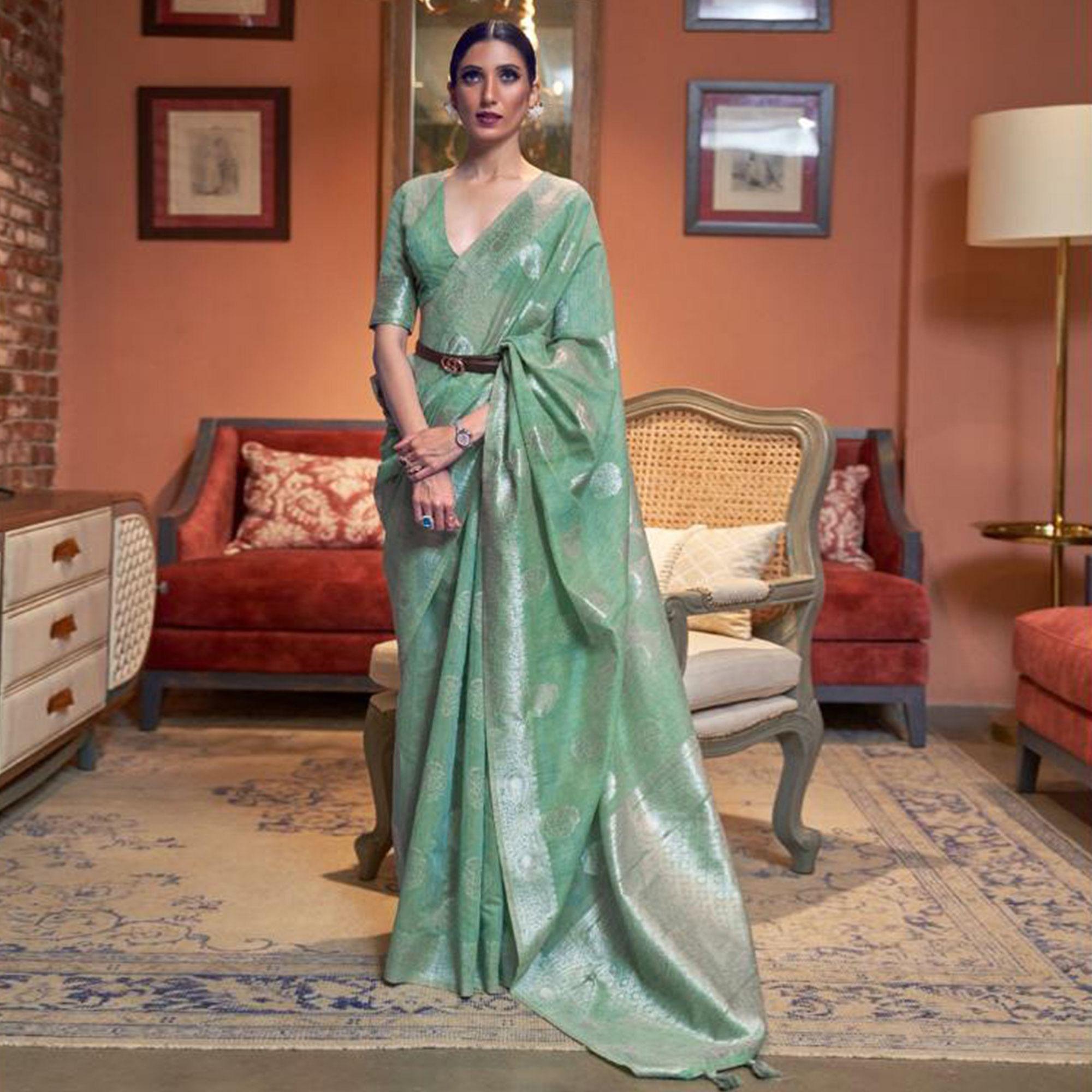 Sea Green Woven Linen Saree With Tassels - Peachmode