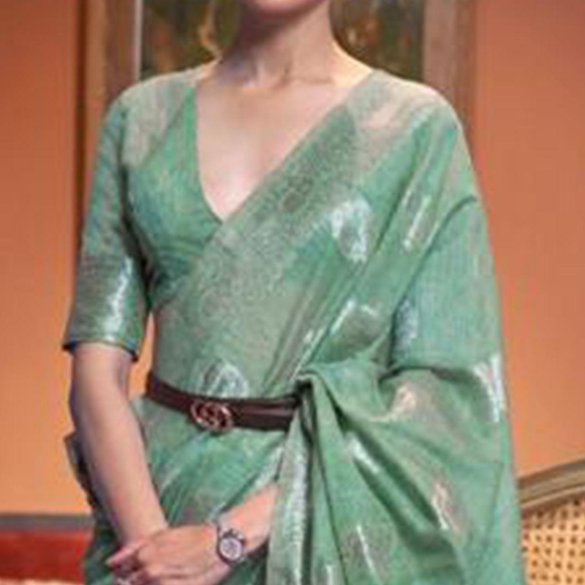 Sea Green Woven Linen Saree With Tassels - Peachmode