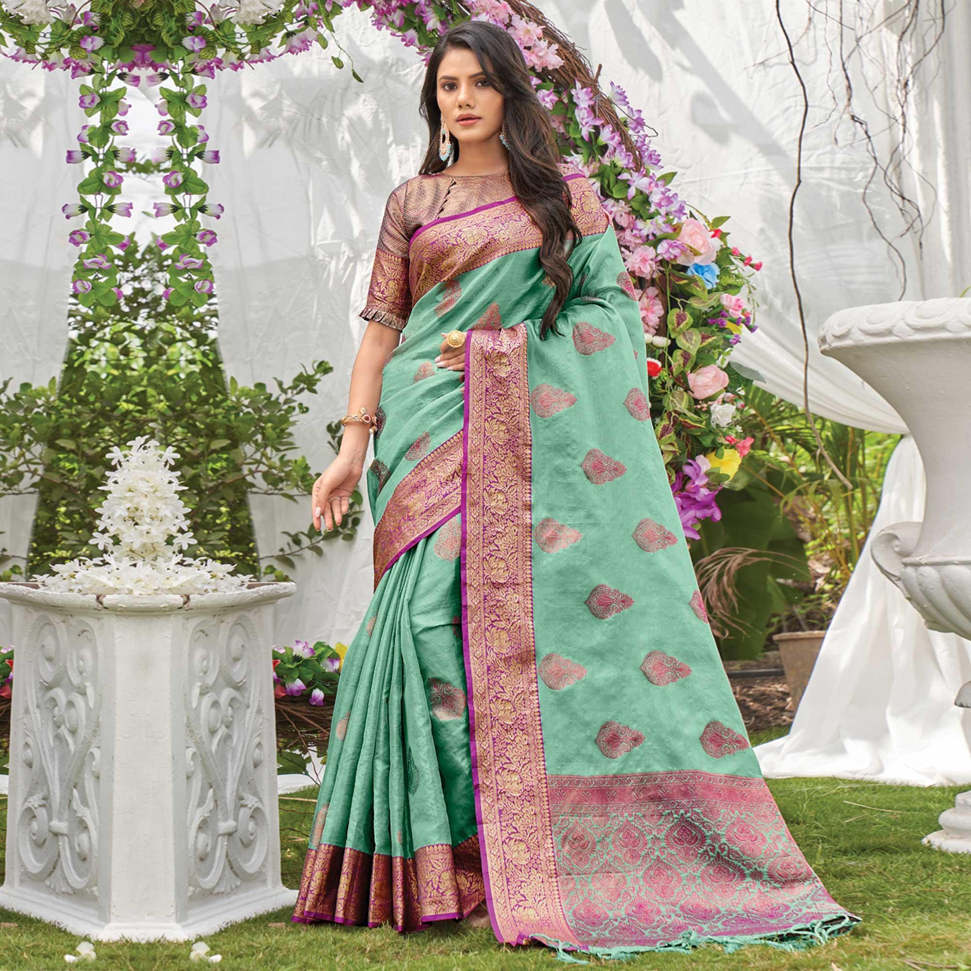 Sea Green Woven Organza Saree with Tassels - Peachmode