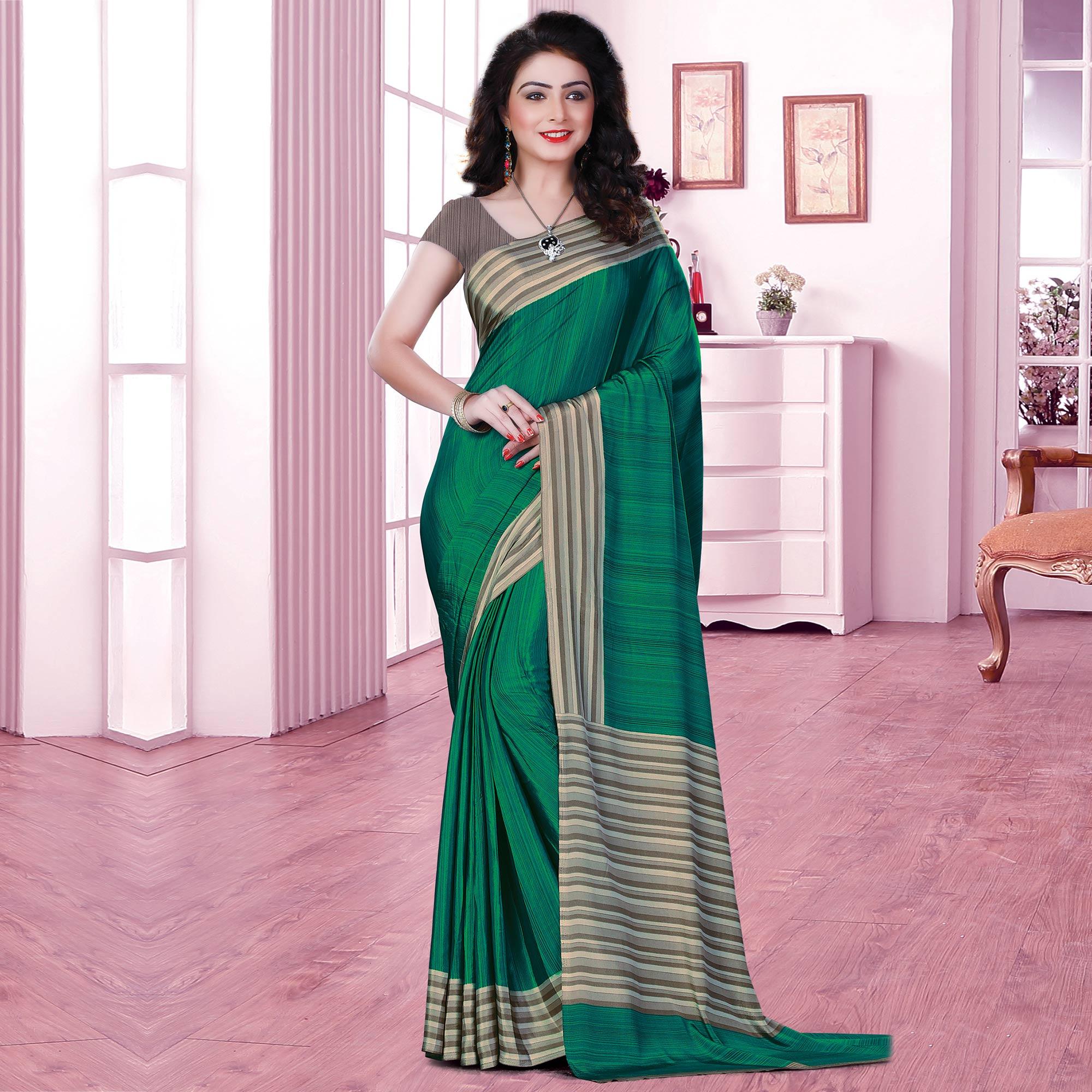 Sensational Green Coloured Casual Wear Printed Crepe Saree - Peachmode