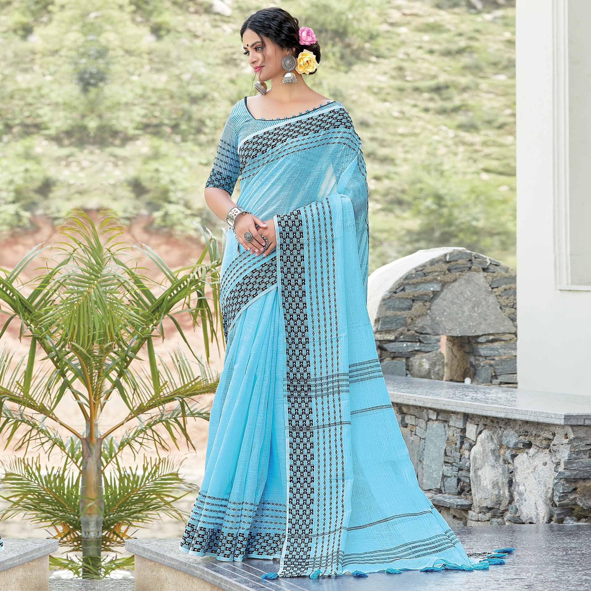 Sky Blue Festive Wear Printed Linen Saree - Peachmode