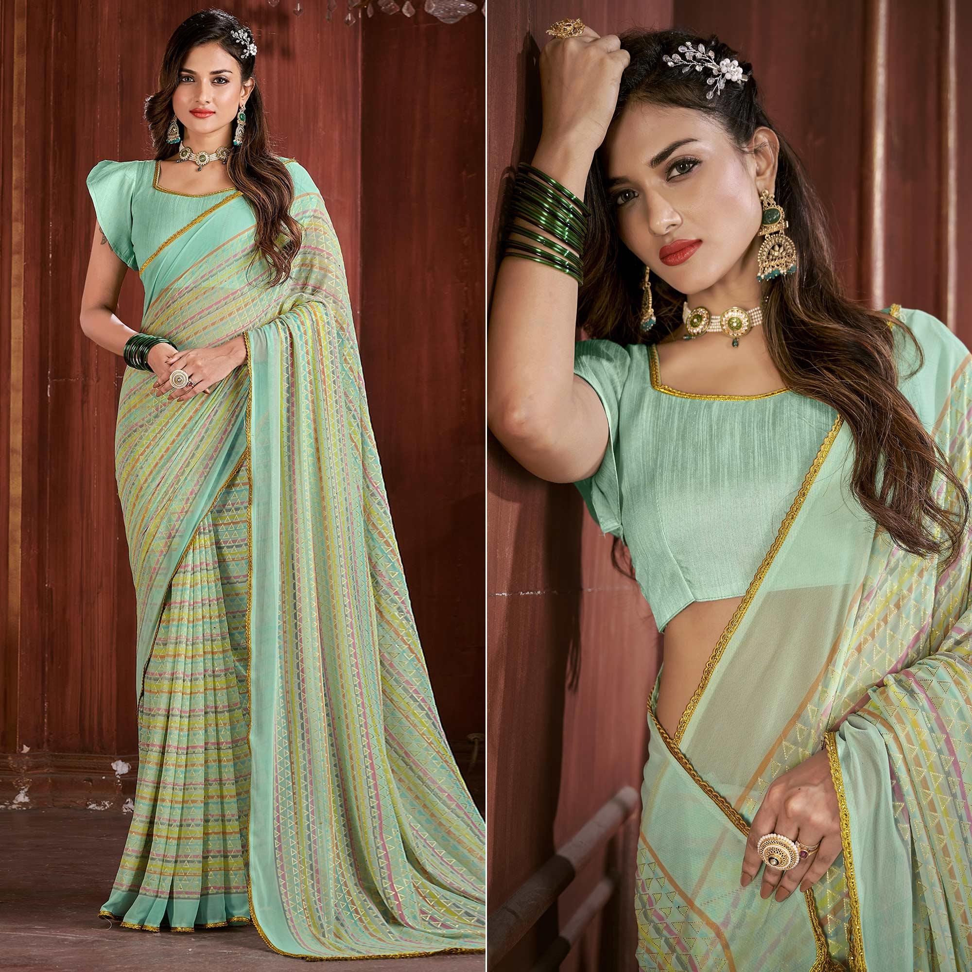 Sky Blue Foil Printed Georgette Saree - Peachmode
