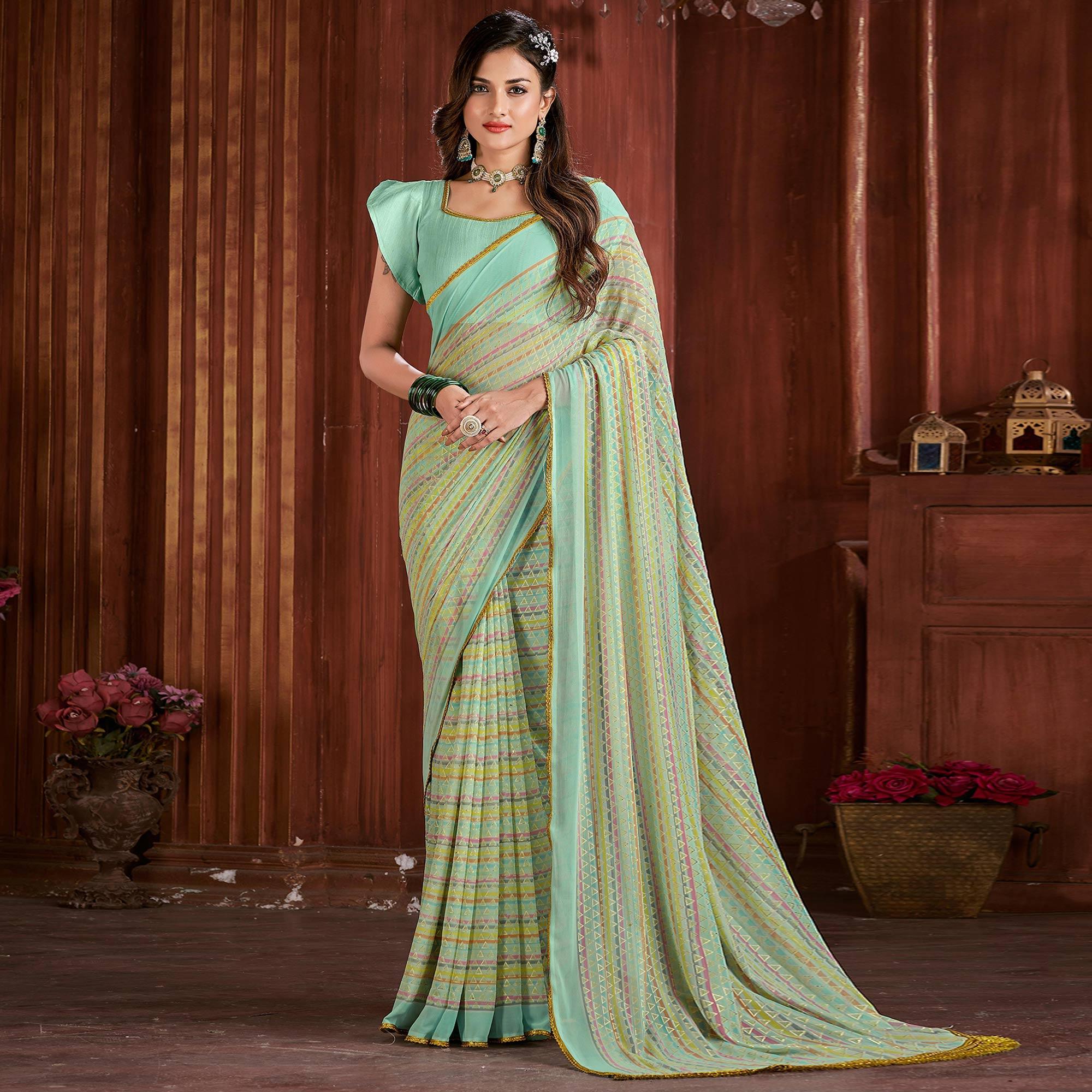 Sky Blue Foil Printed Georgette Saree - Peachmode
