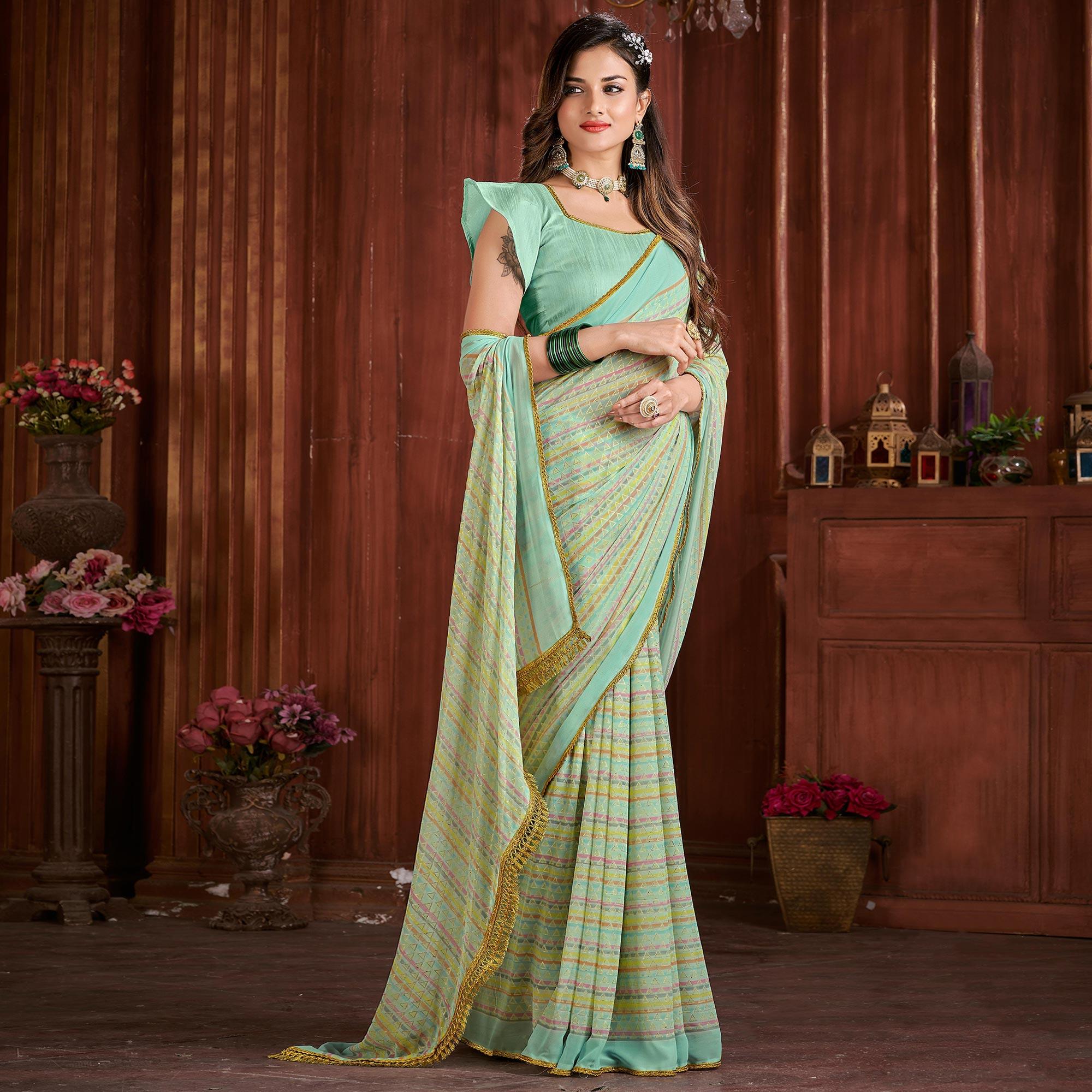 Sky Blue Foil Printed Georgette Saree - Peachmode