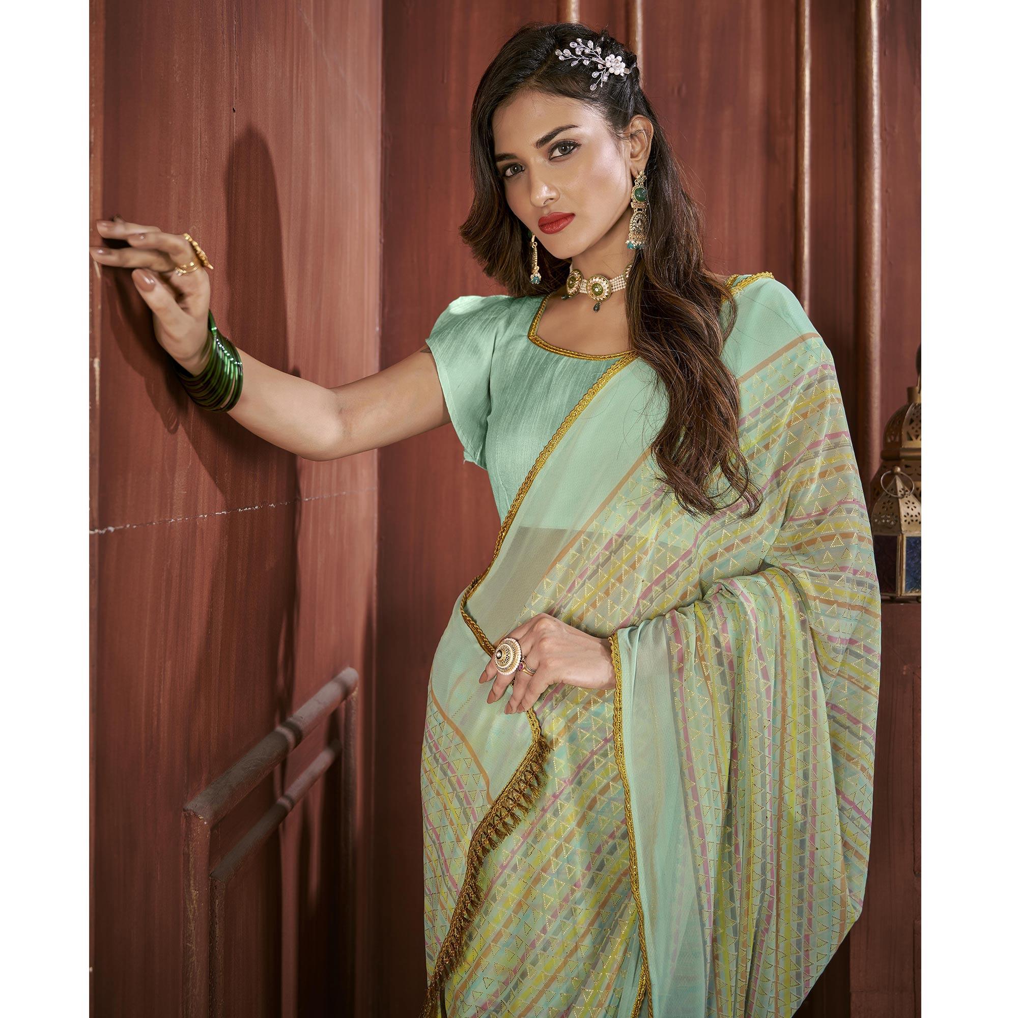 Sky Blue Foil Printed Georgette Saree - Peachmode