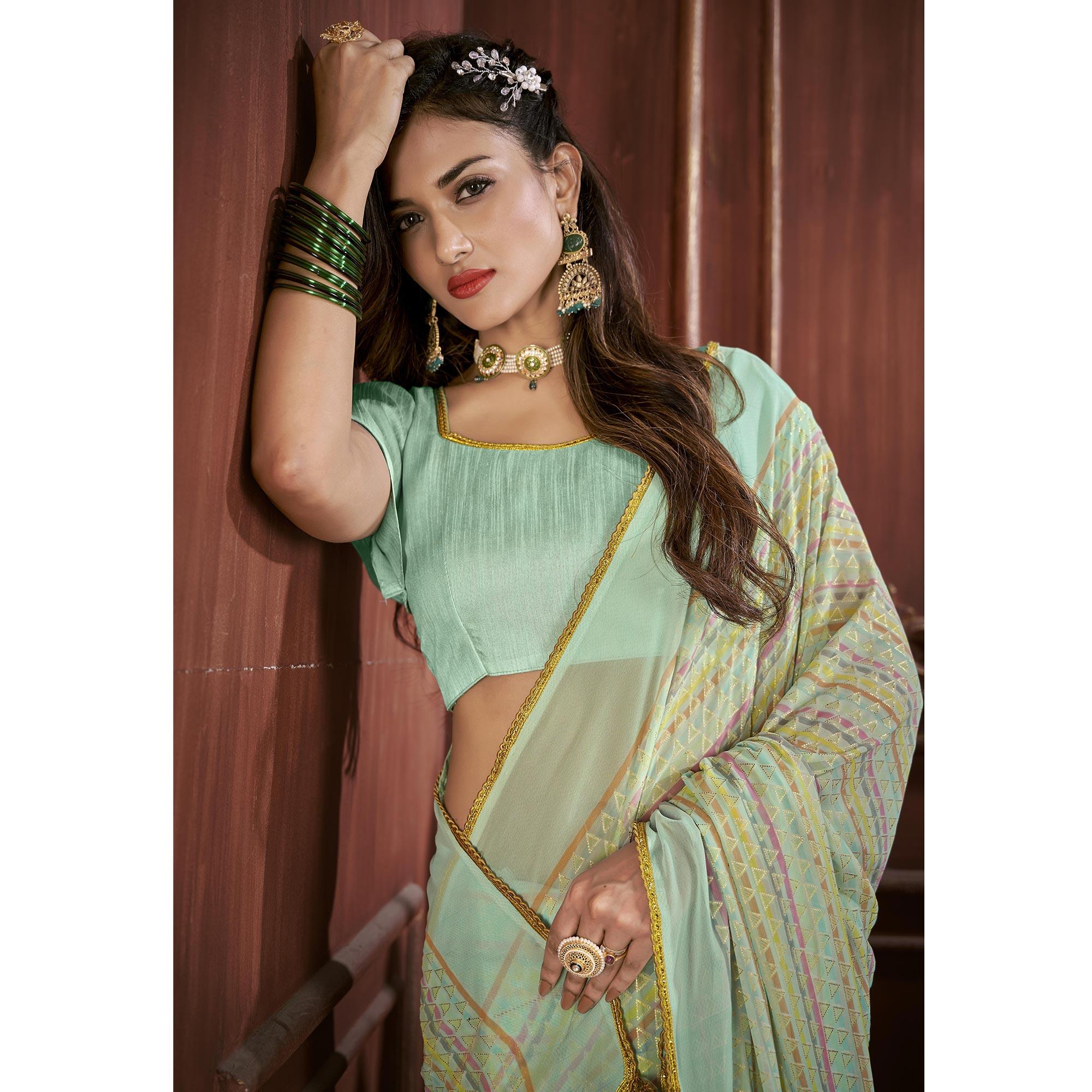 Sky Blue Foil Printed Georgette Saree - Peachmode