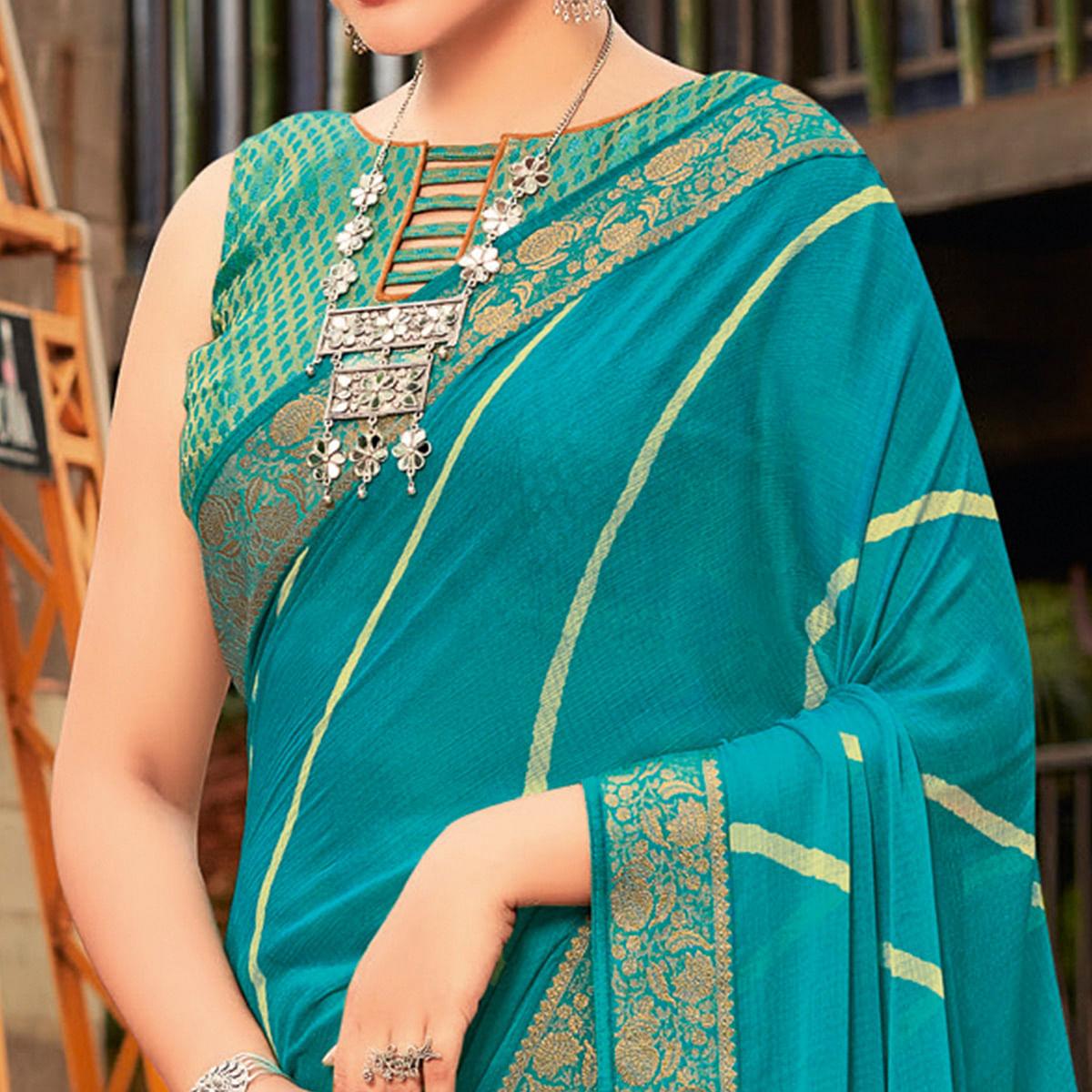 Sky Blue Partywear Printed Chiffon Saree With Border - Peachmode