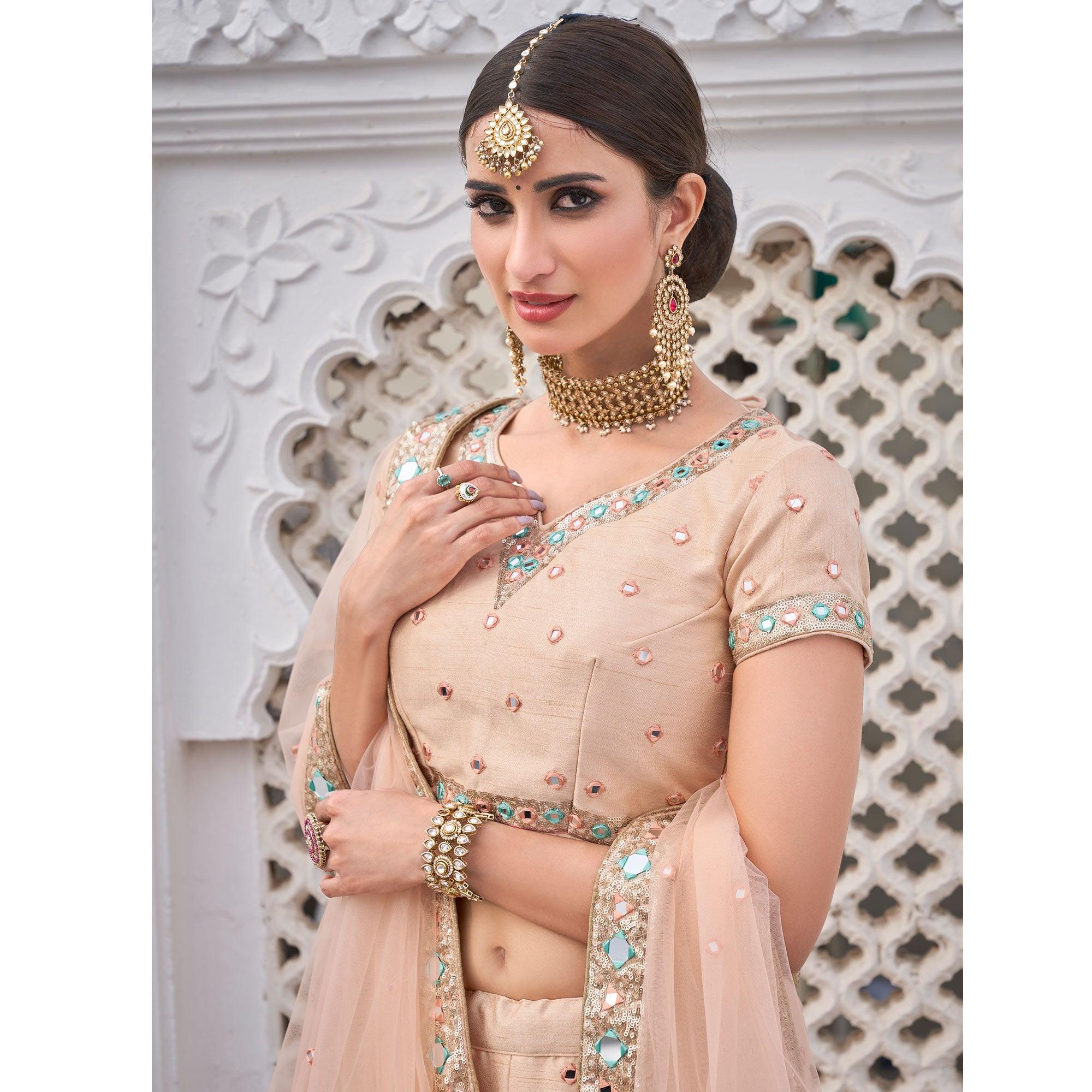 Sophisticated Peach Coloured Wedding Wear Mirror Work Heavy Silk Lehenga Choli - Peachmode