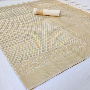 Staring Cream Colored Festive Wear Woven Silk Saree With Tassels - Peachmode