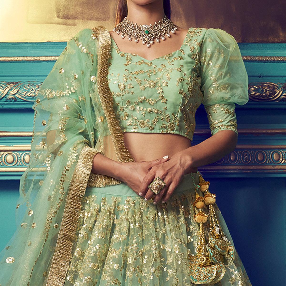 Staring Green Colored Partywear Embroidered Soft Net Lehenga Choli - Peachmode