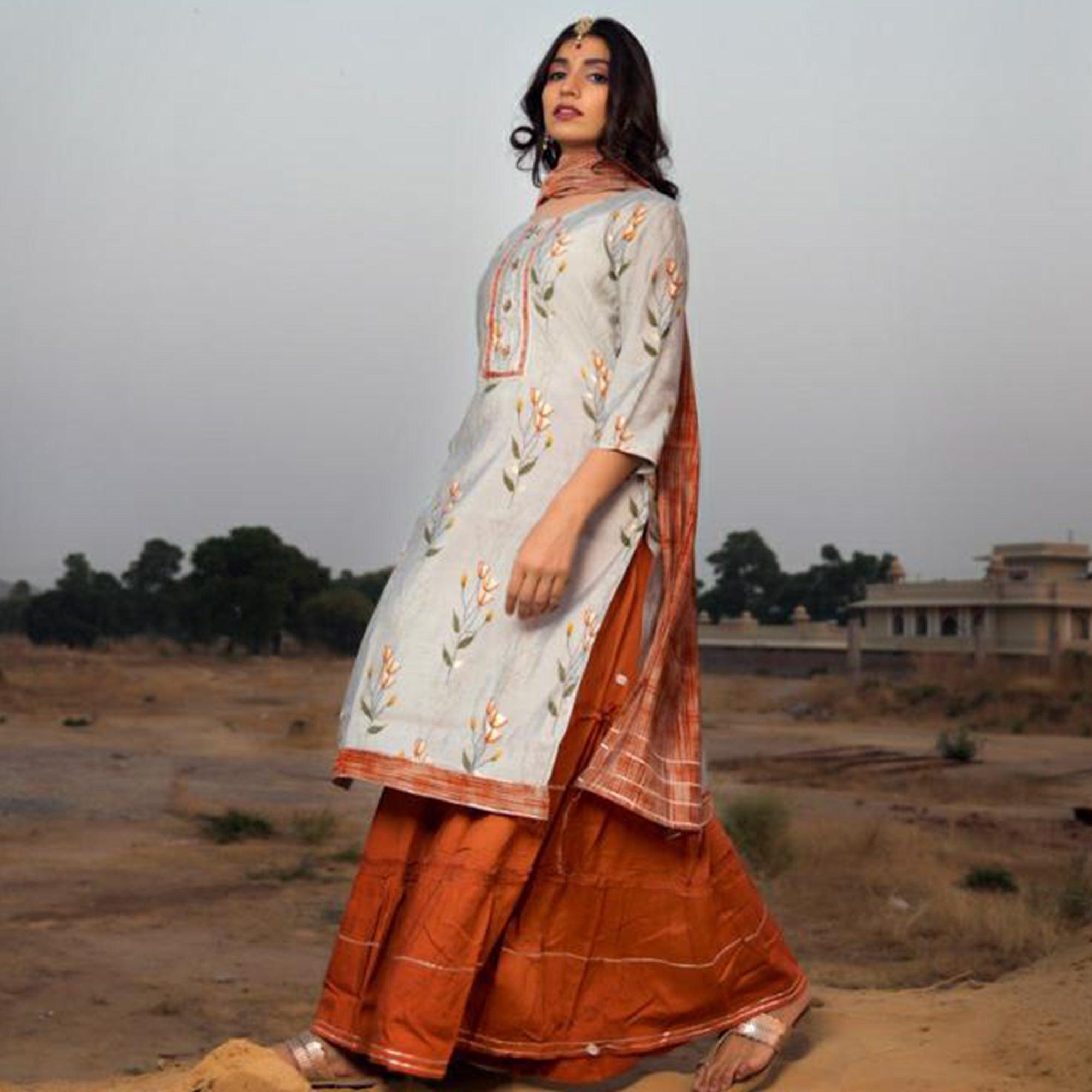 Staring Light Grey Colored Casual Wear Printed Muslin Kurti - Palazzo Set - Peachmode