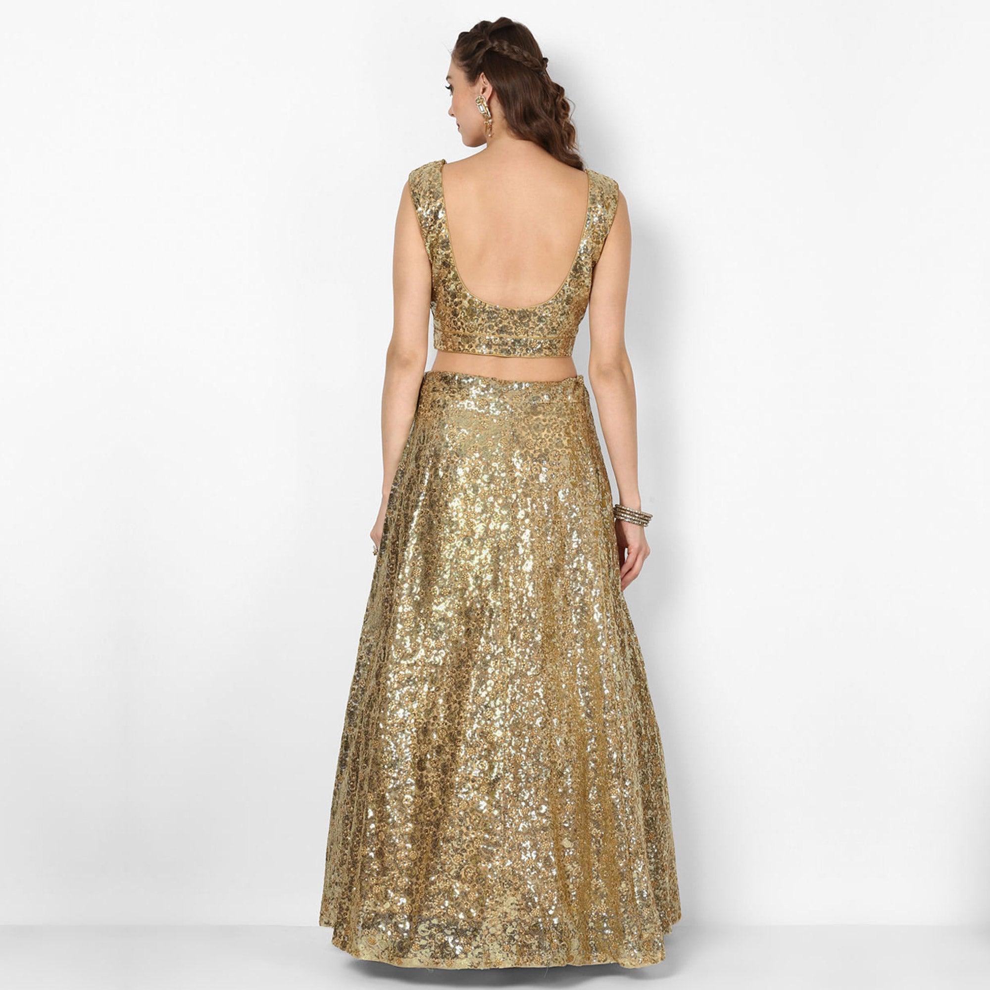 Stunning Golden Colored Partywear Embroidered Netted Lehenga Choli - Peachmode