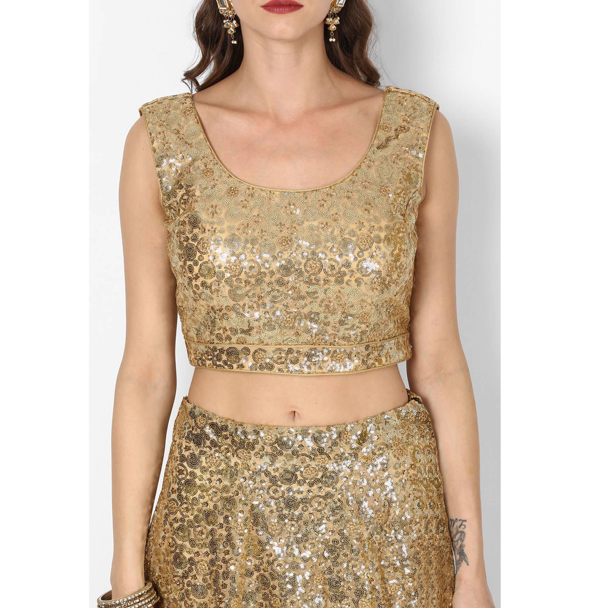 Stunning Golden Colored Partywear Embroidered Netted Lehenga Choli - Peachmode