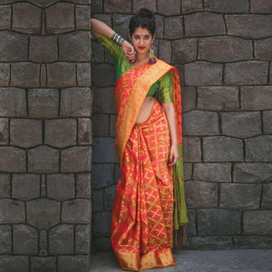 Stunning Orange Colored Festive Wear Designer Woven Patola Silk Saree - Peachmode