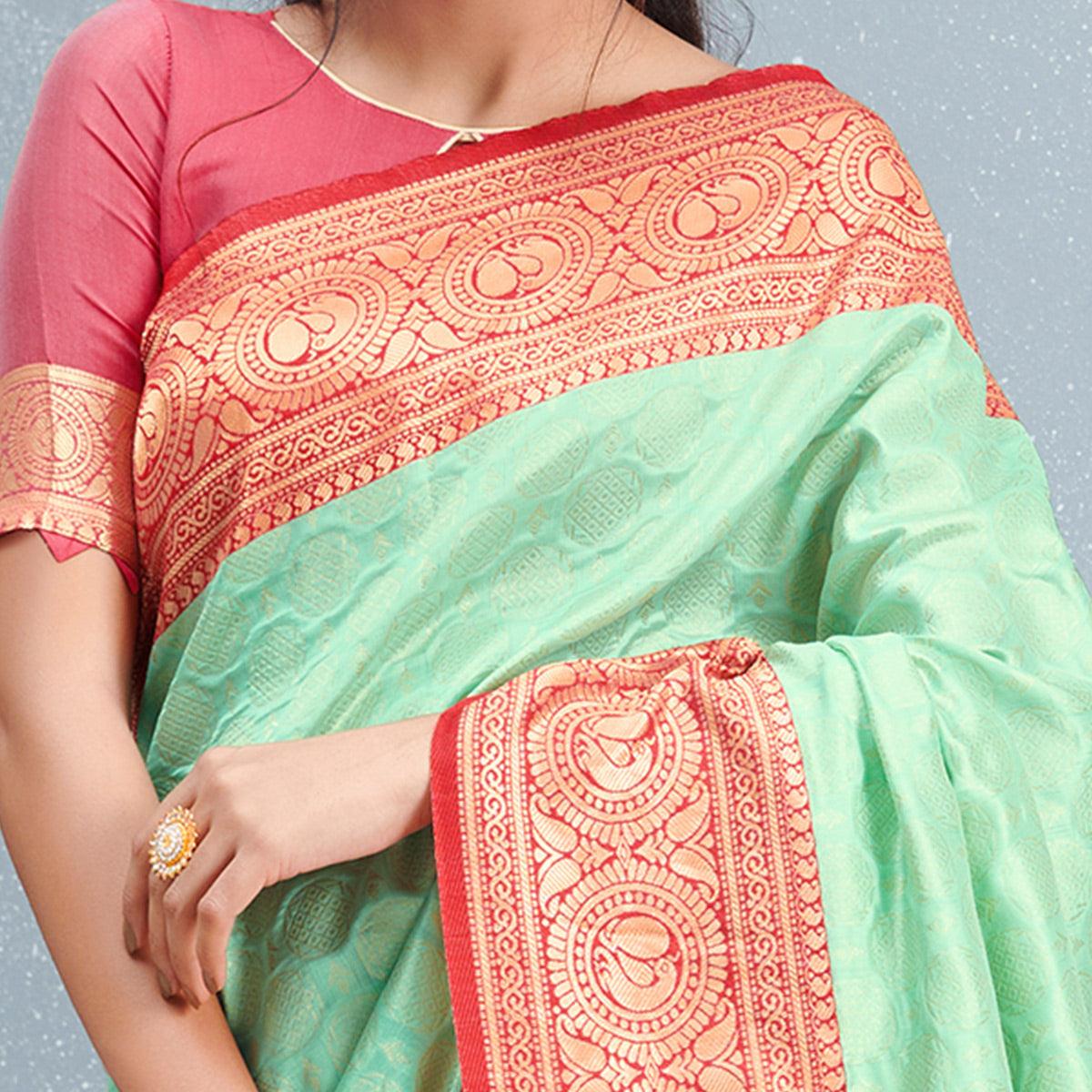 Stunning Pista Green Colored Festive Wear Woven Silk Saree - Peachmode