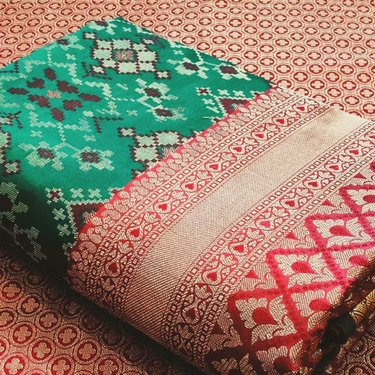 Stunning Rama Green Colored Festive Wear Woven Patola Silk Saree - Peachmode