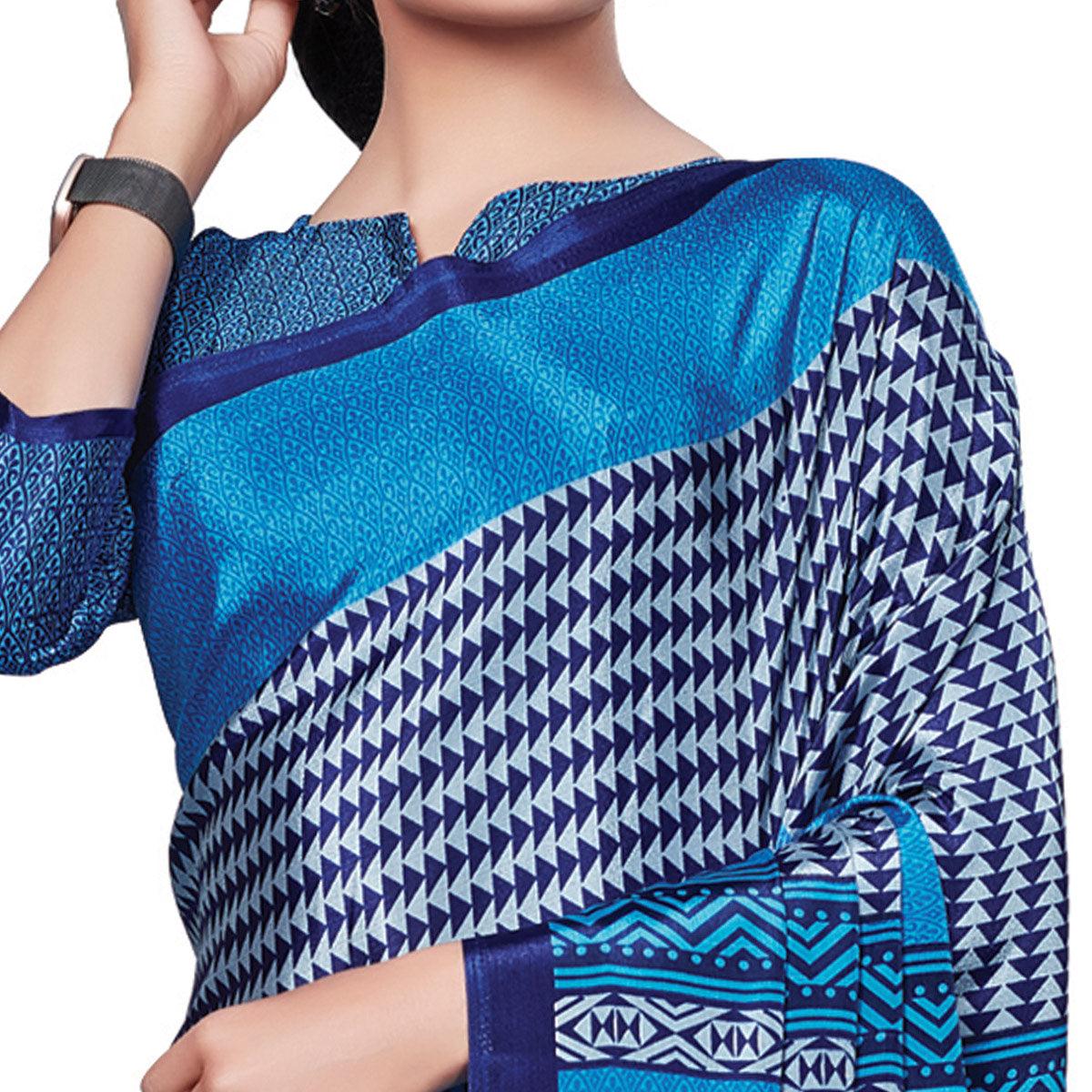 Surpassing Blue Colored Casual Wear Printed Crepe Saree - Peachmode