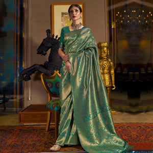 Surpassing Green Colored Festive Wear Woven Silk Saree With Tassels - Peachmode