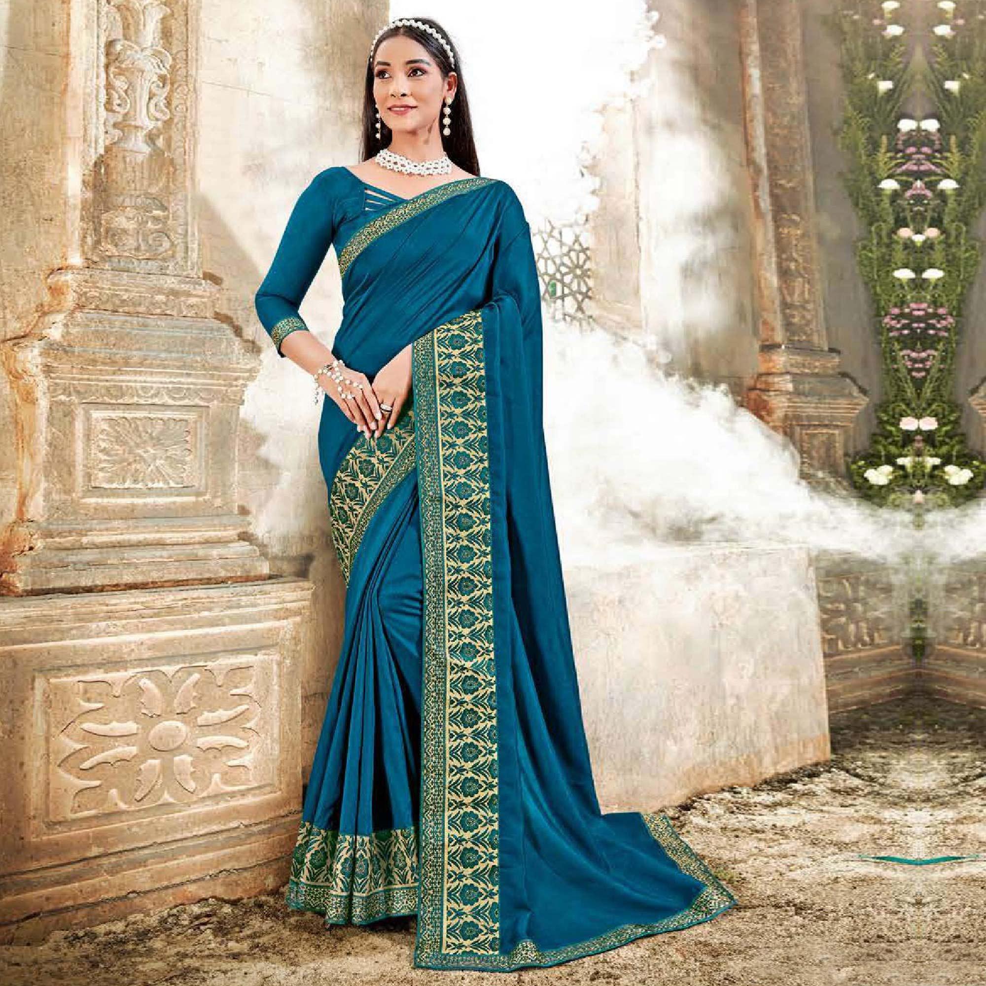 Teal Blue Casual Wear Solid Silk Saree With Fancy Border - Peachmode