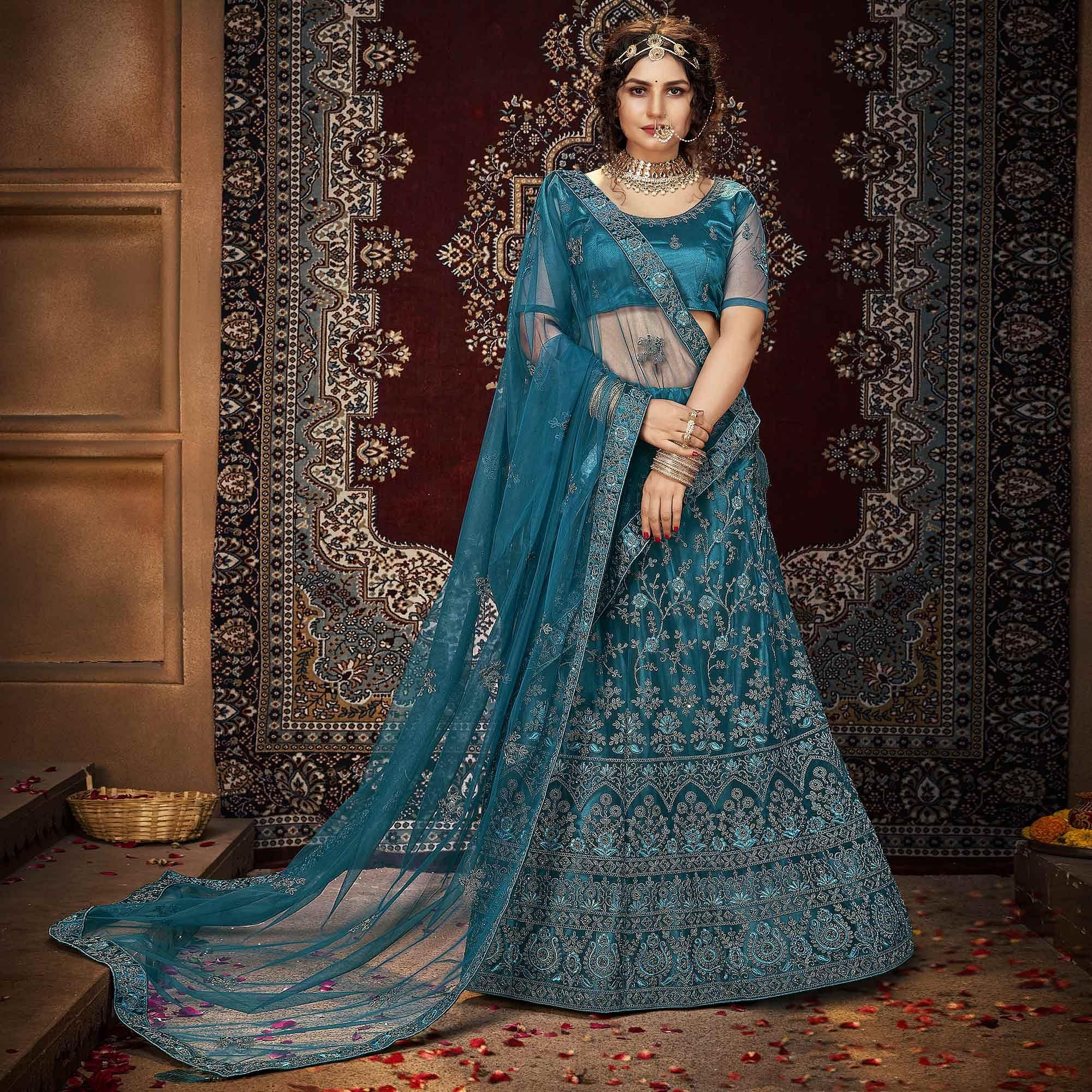 Teal Blue Partywear Multi Sequence Embroidered Net Lehenga Choli - Peachmode