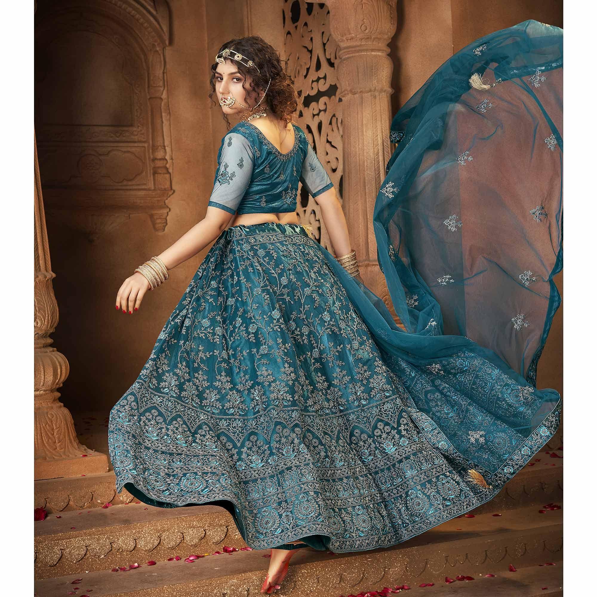 Teal Blue Partywear Multi Sequence Embroidered Net Lehenga Choli - Peachmode