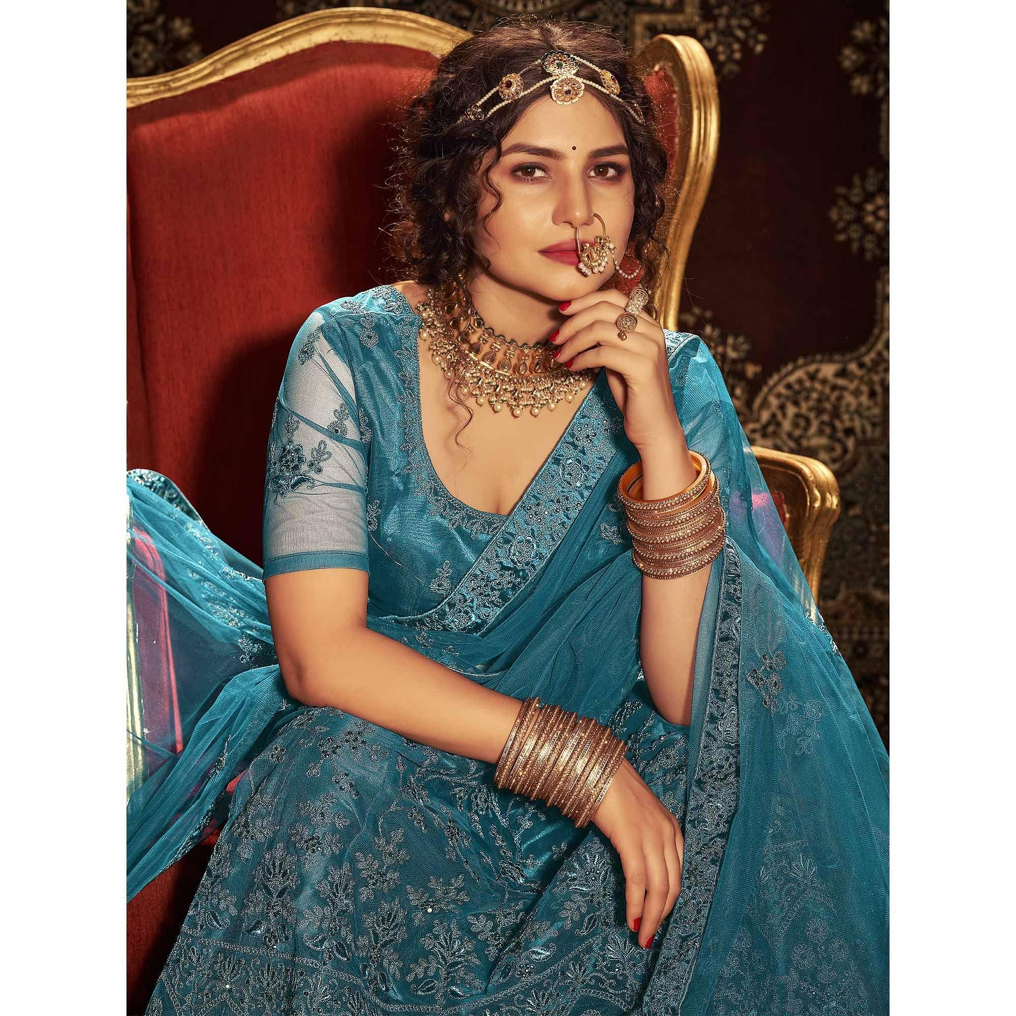 Teal Blue Partywear Multi Sequence Embroidered Net Lehenga Choli - Peachmode