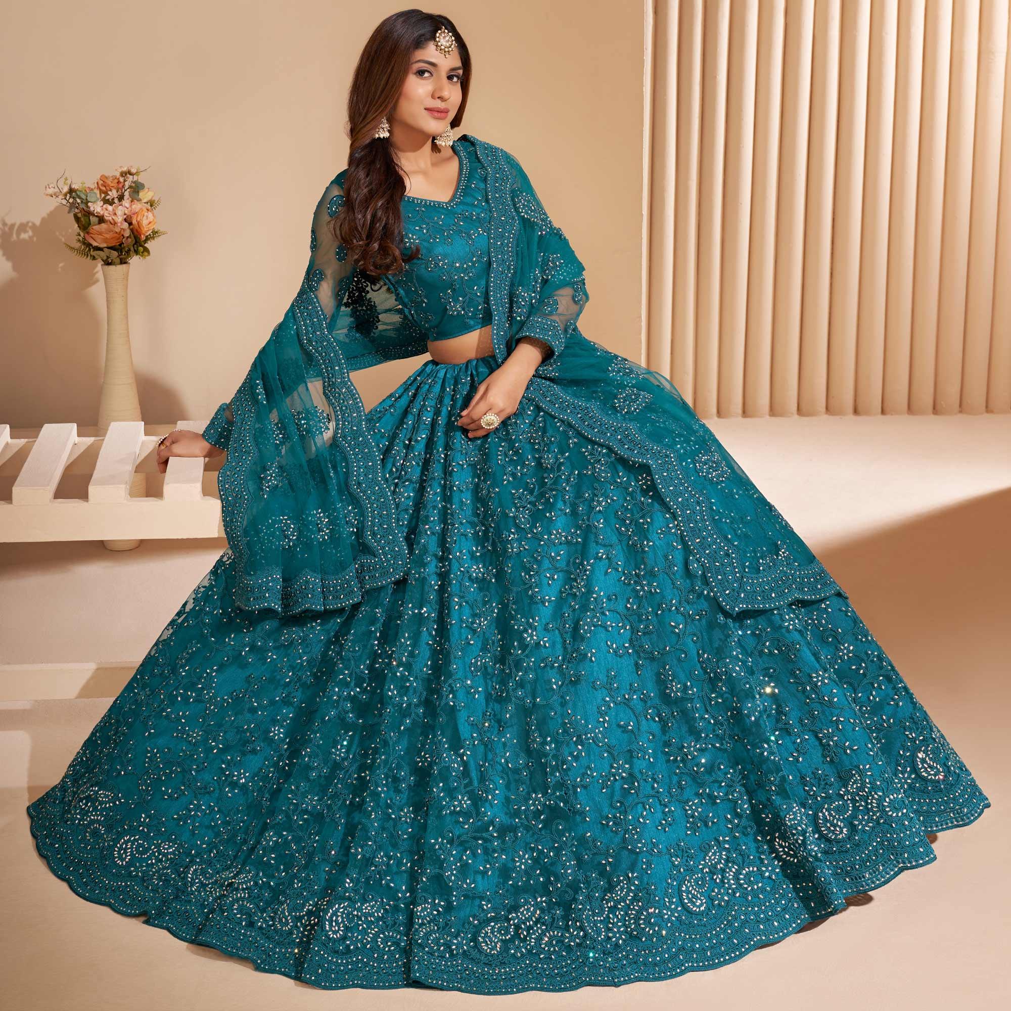 Teal Blue Wedding Wear Embroidered With Embellished Net Lehenga Choli - Peachmode