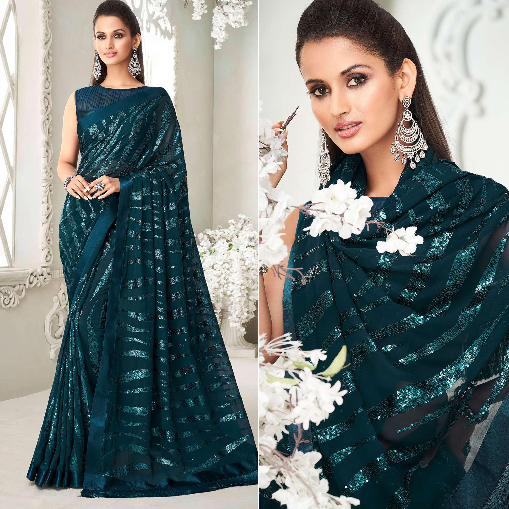 Teal Green Sequence Embroidered Georgette Saree With Tassels - Peachmode