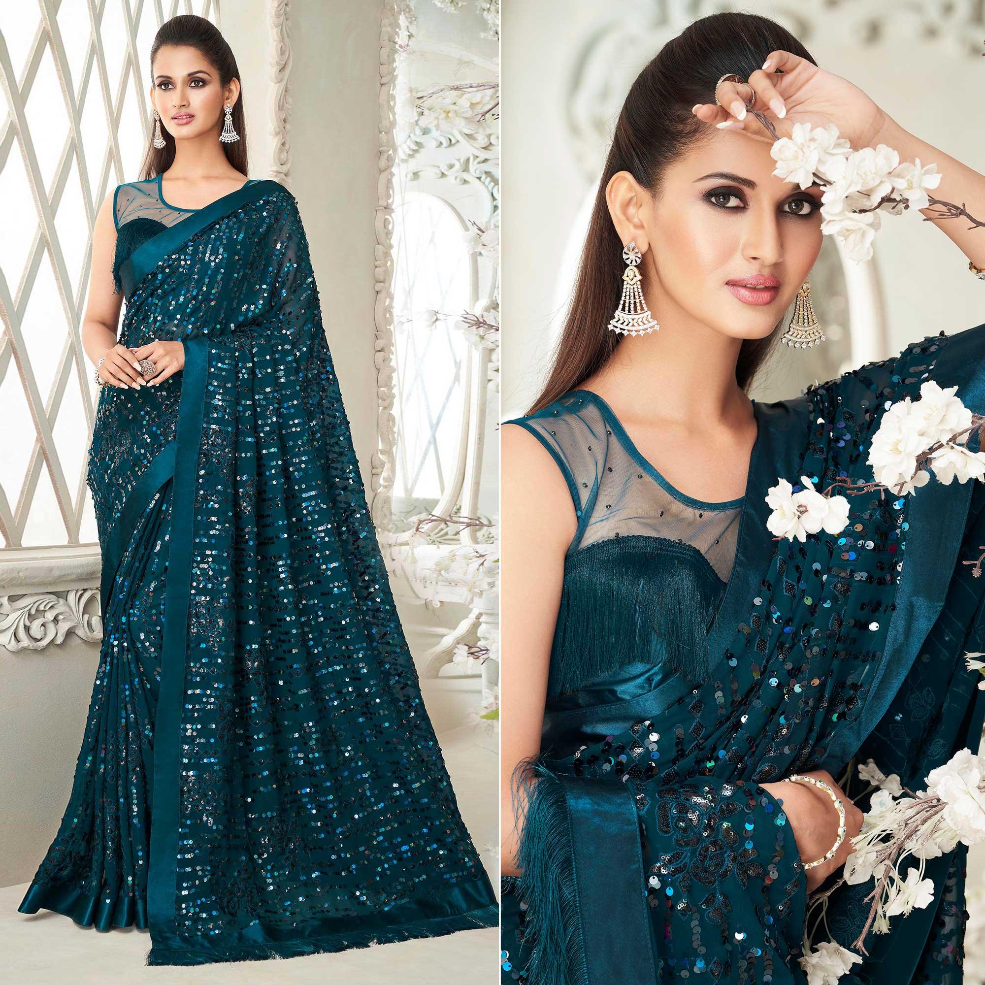 Teal Green Sequence Embroidered Georgette Saree With Tassels - Peachmode