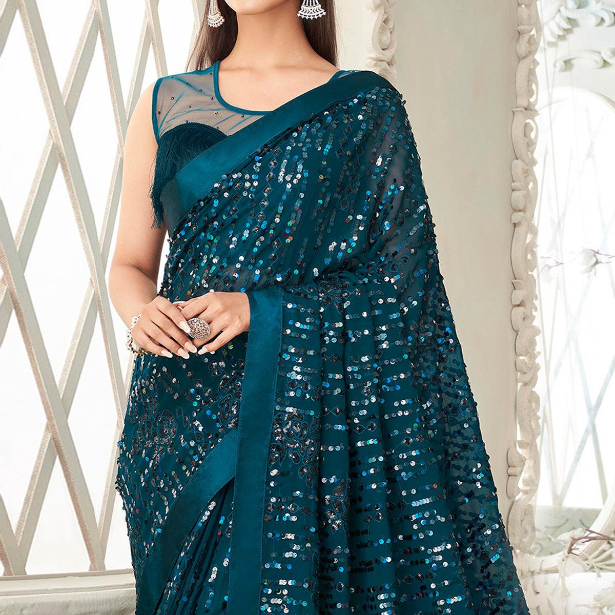 Teal Green Sequence Embroidered Georgette Saree With Tassels - Peachmode