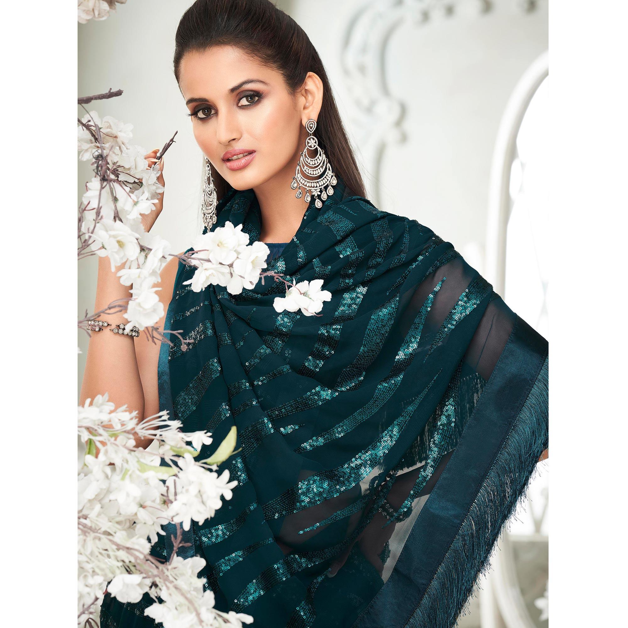 Teal Green Sequence Embroidered Georgette Saree With Tassels - Peachmode