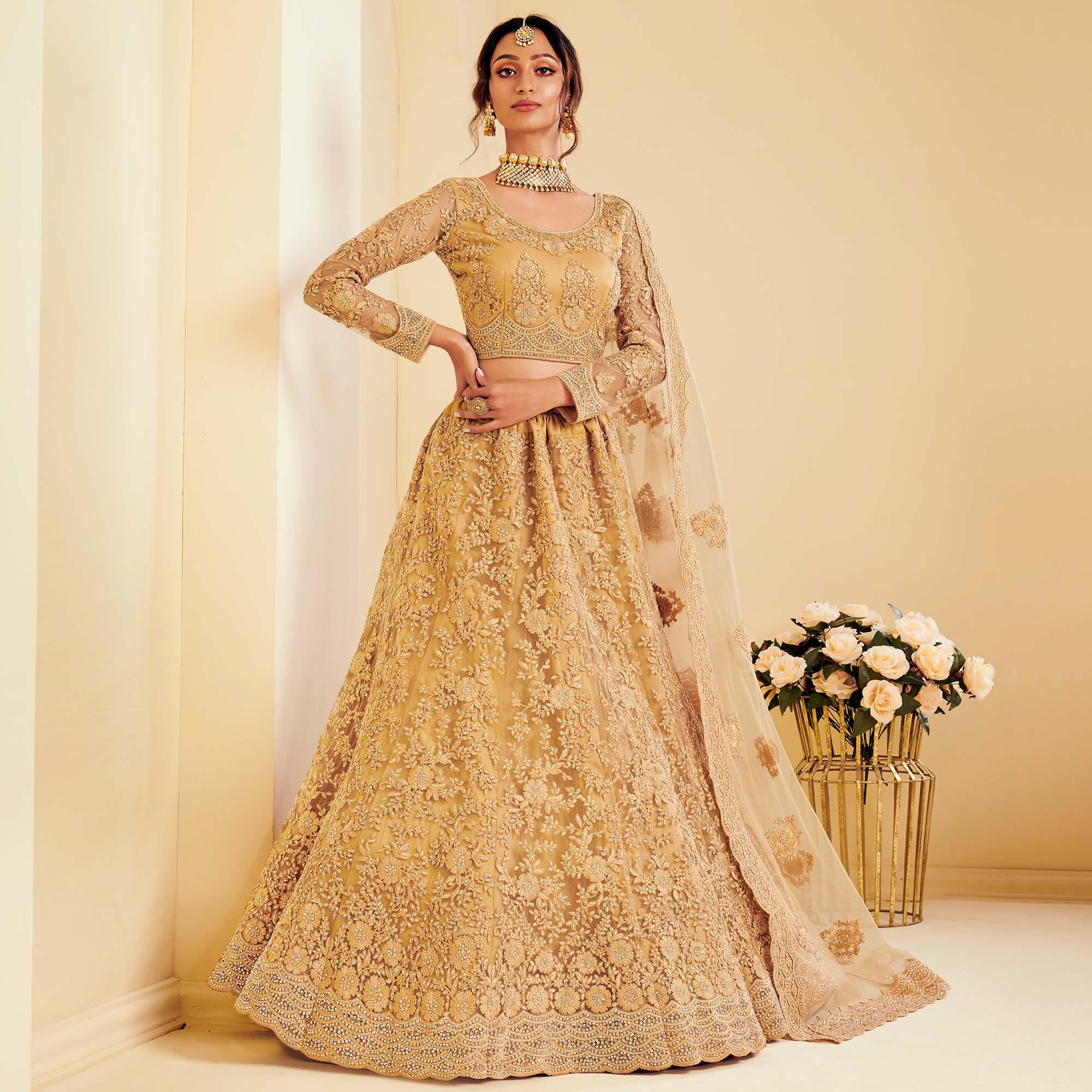 Trendy Golden Coloured Wedding Wear Cording Embroidered Net Lehenga Choli - Peachmode