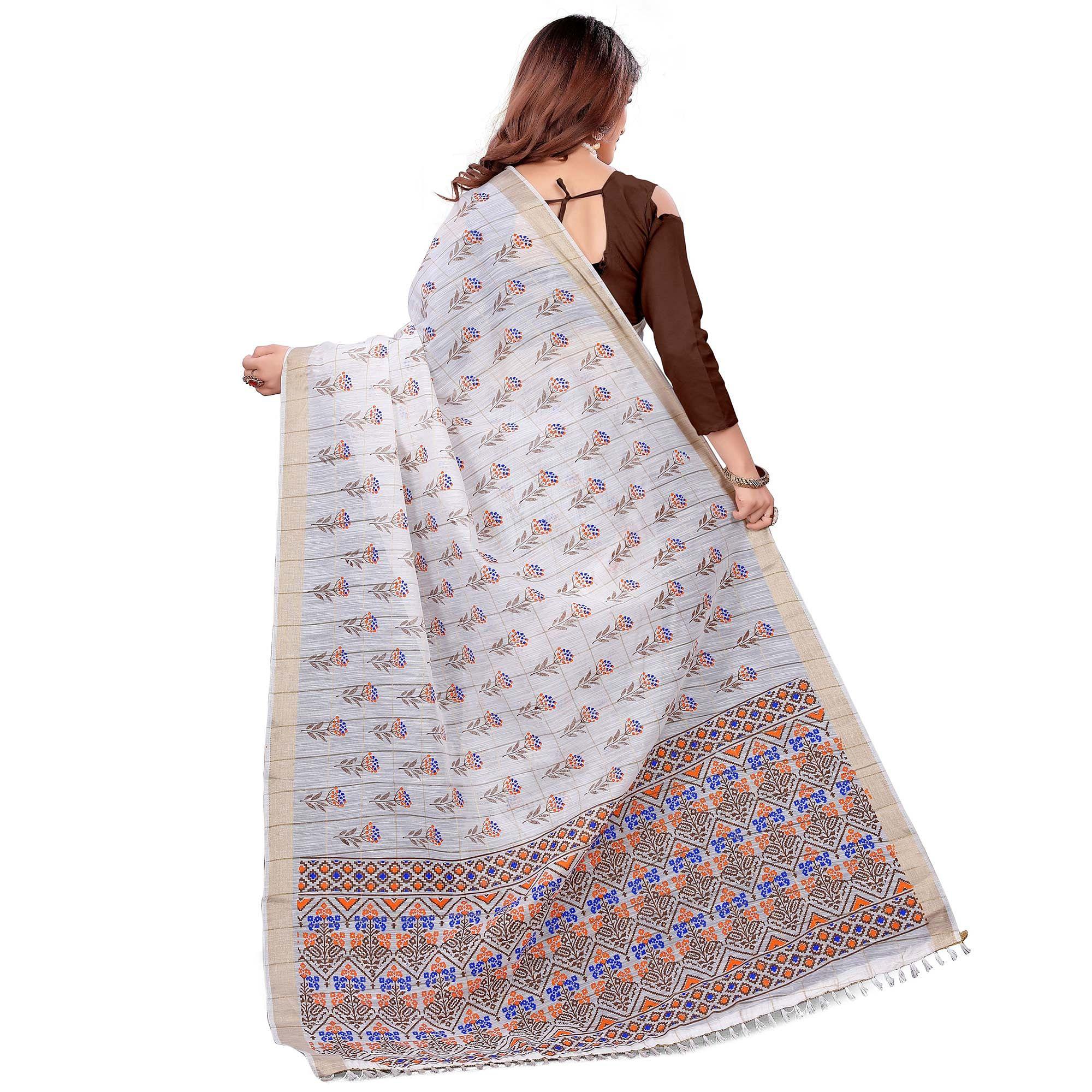 Trendy White Colored Casual Wear Printed Cotton Saree With Tassels - Peachmode