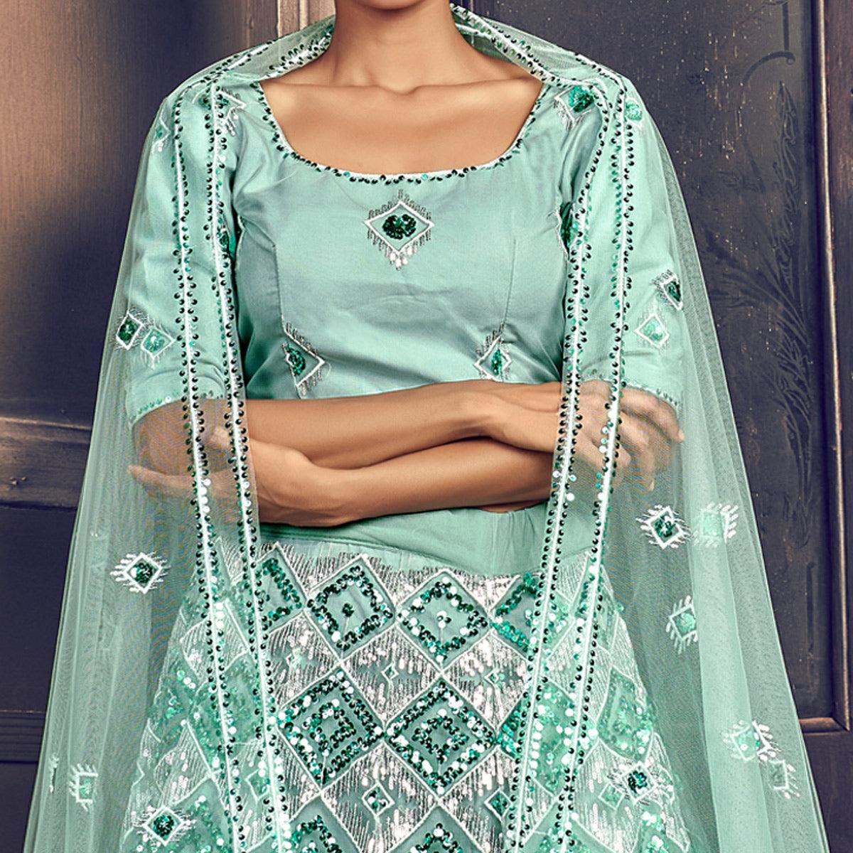 Turquoise Blue Partywear Sequence Embroidered Net Lehenga Choli - Peachmode