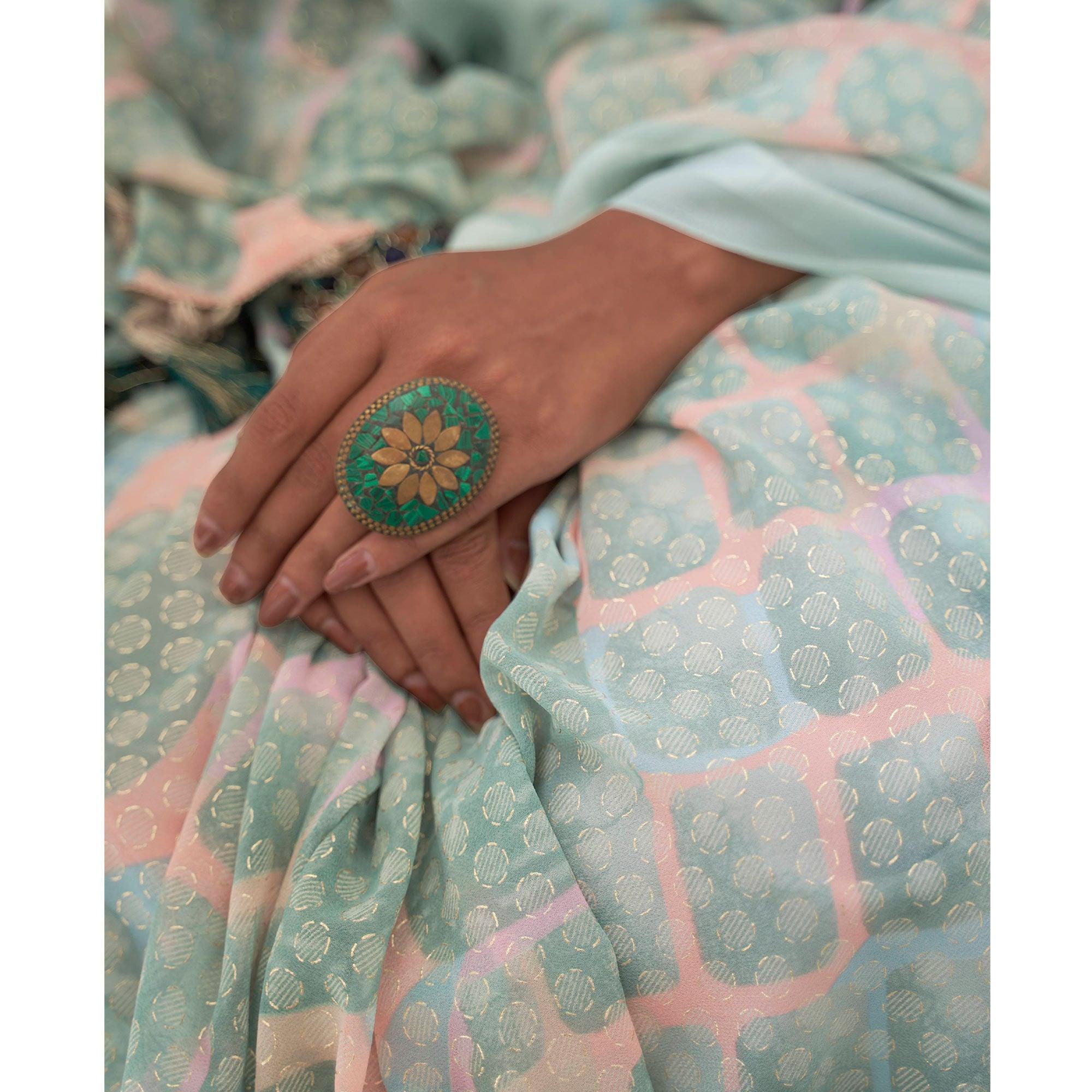 Turquoise Casual Wear Foil Printed Georgette Saree With Jacquard Border - Peachmode