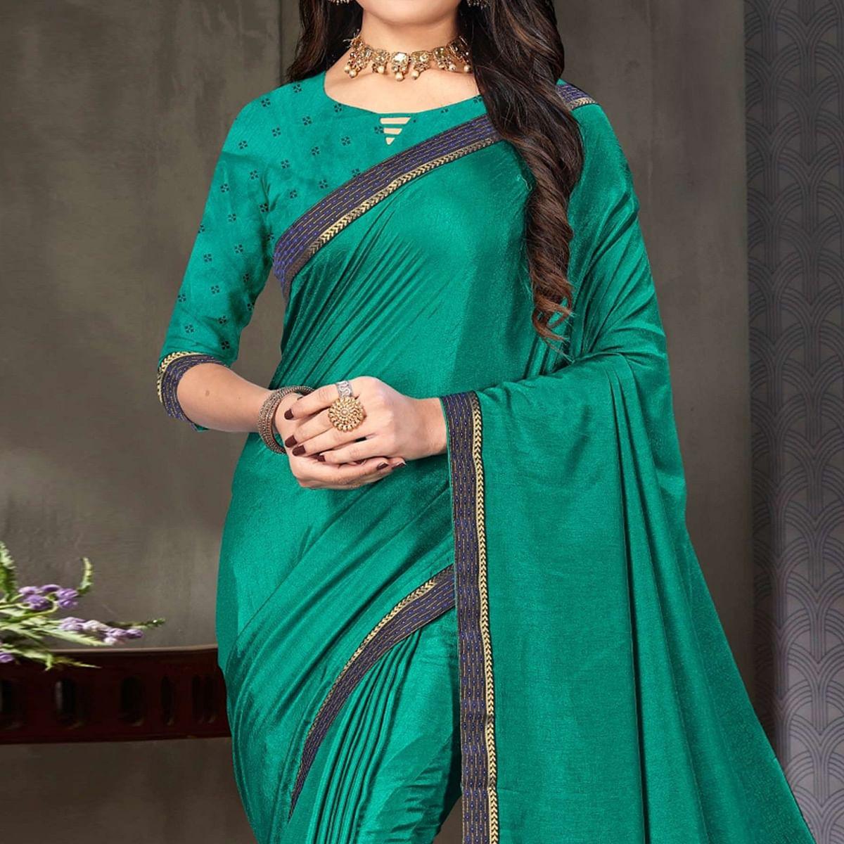 Turquoise Festive Wear Embellished Art Silk Saree - Peachmode